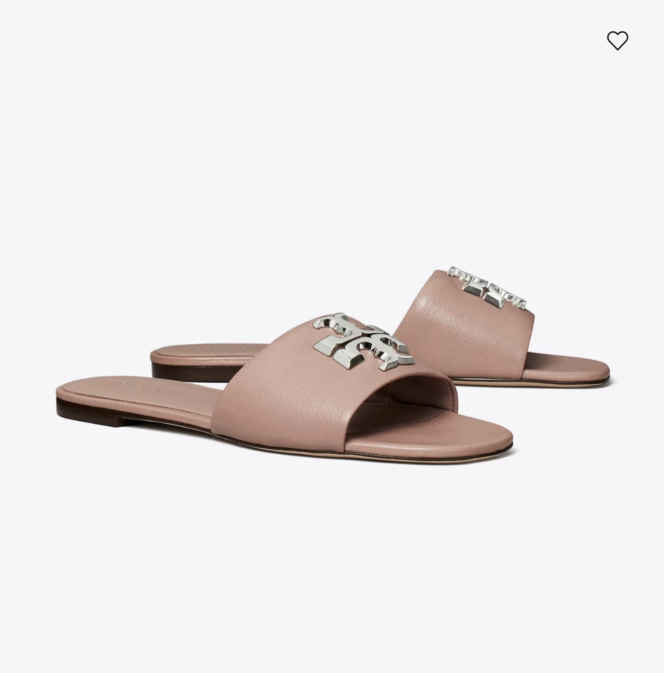 ELEANOR SLIDE

A combination of restraint and opulence. Set against clean lines of a minimal leather slide, the bold curves of sculptural hardware. With a comfortable cushioned footbed

#LTKWorkwear #LTKSeasonal #LTKTravel