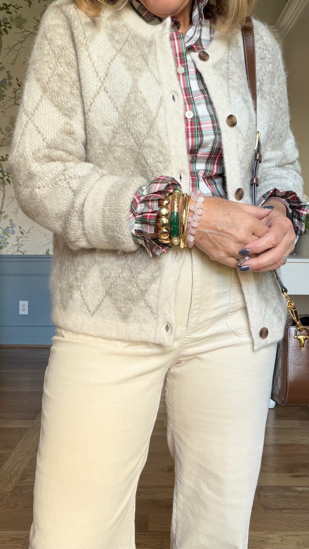 Argyle sweater medium 
Plaid ruffle collar wearing med petite but need a large petite 
cream corduroy pants 28 petite I sized down 
Size up in boots 
20% off my bracelets code NANETTE20

#LTKSaleAlert #LTKOver40 #LTKFindsUnder100