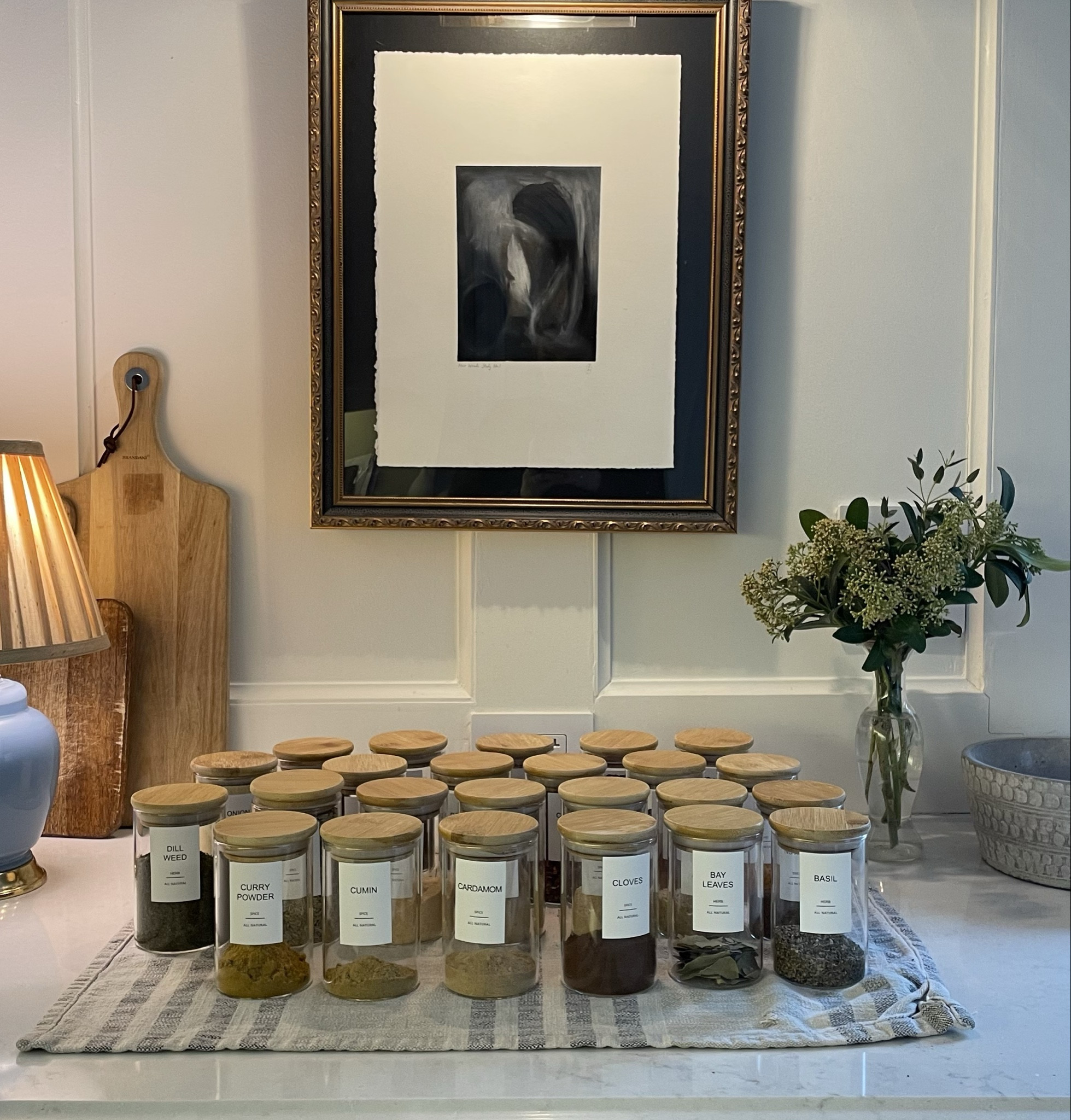 Clear glass spice jars with labels and wood lids. Can’t recommend enough!

#LTKHome #LTKSeasonal