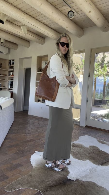 This maxi dress from Skims and Linen Blazer from Everlane. Give me the perfect comfy and breezy look for high temps while also feeling chic! I love adding a fun sandal and chic shoulder bag to the mix. 

#LTKstyletip #LTKover40 #LTKSeasonal