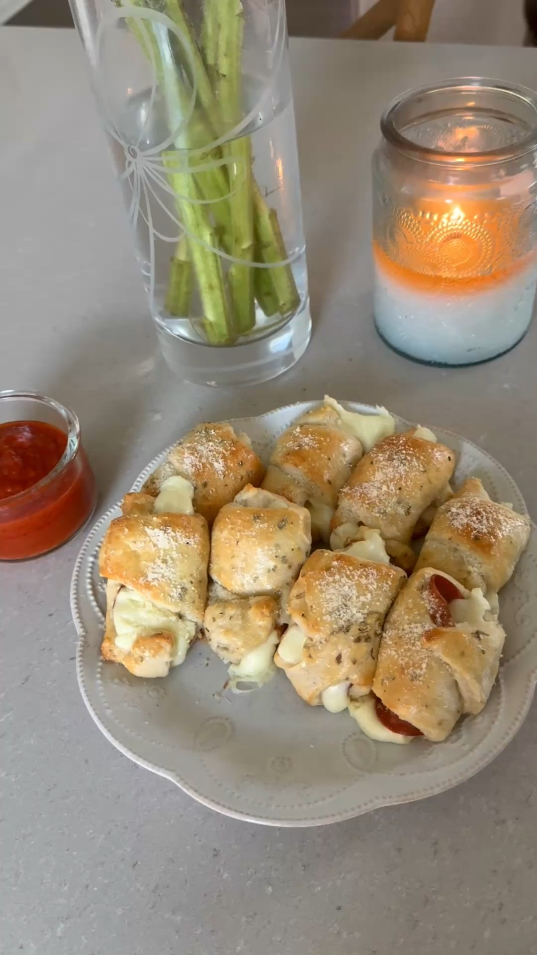 When I tell you all three of my kids devoured both of these 😍 They’re mom approved too! These oatmeal balls are perfect for when you’re craving a little something sweet. The pizza roll ups are great for grab and go or school lunches 
👍🏼 

Pozza Roll Ups 
Ingredients 
• 2 packages Pillsbury crescent rolls
• 8 mozzarella cheese sticks cut in 1/2 
• 1 package pepperoni slices
• 1 teaspoon garlic powder
• 1 teaspoon oregano
• 1 teaspoon basil
• 1 egg
• 2 tablespoons freshly grated Parmesan cheese
• Pizza sauce or marinara sauce optional

Preheat oven to 375 degrees
Remove crescent rolls from the package. Starting with the wide end, place a mozzarella stick on the end, and place pepperonis along the surface of the crescent roll. Starting with the widest end, roll into the most narrow end. Place on an ungreased cookie sheet. Combine garlic powder, oregano, and basil in a small bowl. Beat the egg in the small bowl. Brush on top. Bake for 15 minutes or until golden brown. Sprinkle with Parmesan cheese. Serve with warm pizza sauce or marinara sauce.

Oatmeal Balls
• 2 cups of oats
• 1 cup of peanut butter 
• 1 Tbsp of flax seed
• 1 Tbsp of chia seeds 
• 1/4 of honey
• 1/4 cup of chocolate chips 
 • 1 tsp of vanilla 

Mix, roll into balls and refrigerate! 



Target, kids snacks, kids lunch ideas, school lunch, kids meal ideas, kids lunch, kids dinners, pizza roll up recipe, oatmeal balls recipe 

#LTKdayinmylife #LTKmomlife #LTKfoodie