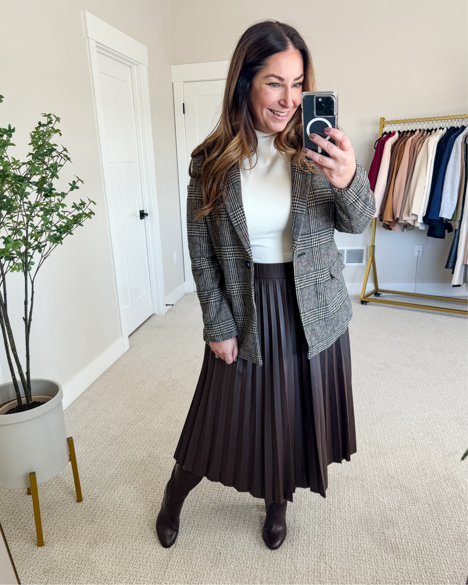 Fall workwear outfit with faux leather pleated skirt 

Skirt tts, L // Bodysuit size up if in-between blazer tts, L  

Workwear, classic style, mid size, size 12, business casual 

#LTKworkwear #LTKSeasonal #LTKmidsize