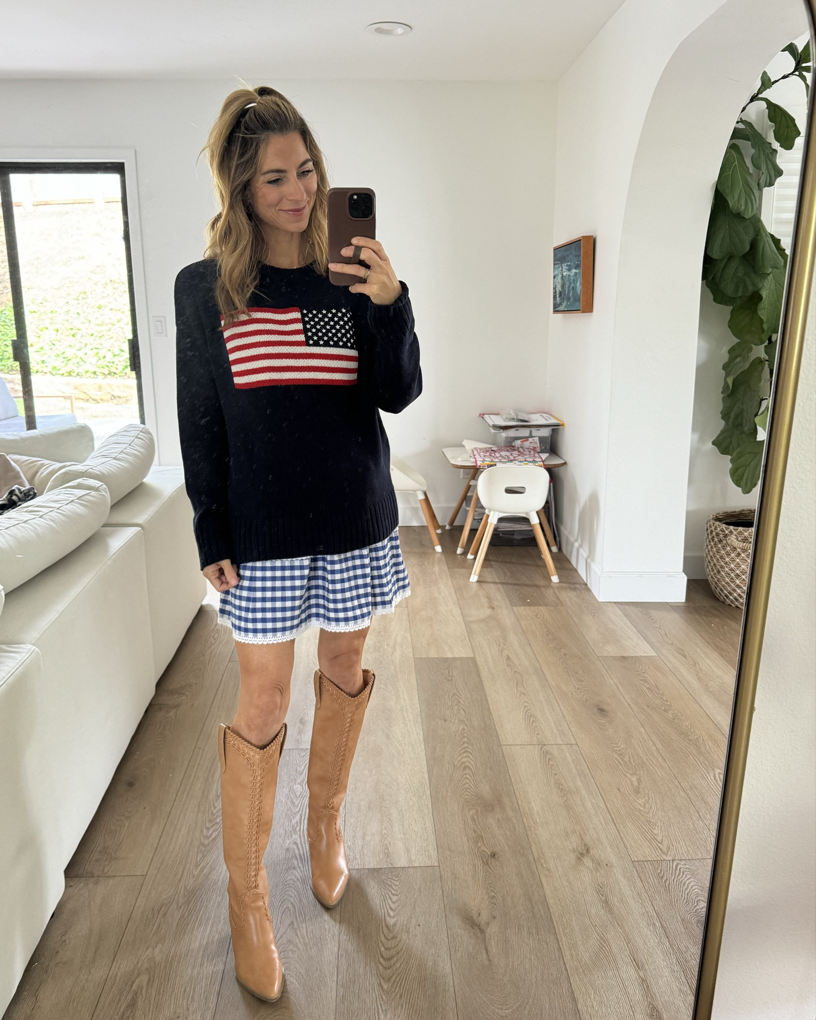 Miss Americana 🇺🇸 a little mix & match but all America for 4th of July festivities and summer fun! Believe it or not, this skirt is from the girls section 🙈 wearing size large. I love the waistline & modest length. I’m 5’5” for reference. 

USA sweater, tall boots, camel boots, show me your mumu boots, gingham skirt, blue gingham, red gingham, patriotic outfit, 4th of July 

#LTKSummerEdit #LTKOver40 #LTKSeasonal