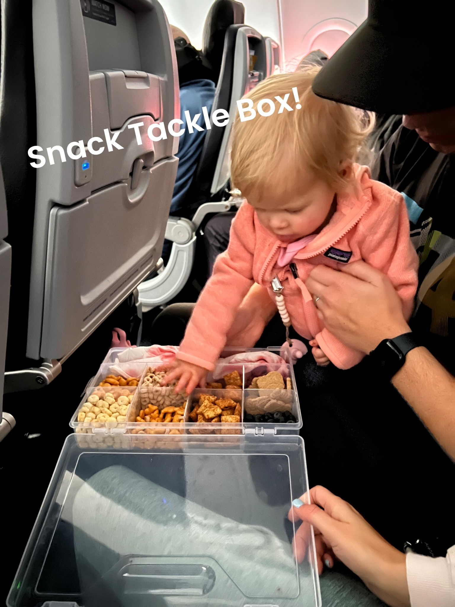 A perfect way to keep snacks for littles on long flights! 

#LTKTravel #LTKBaby #LTKFamily