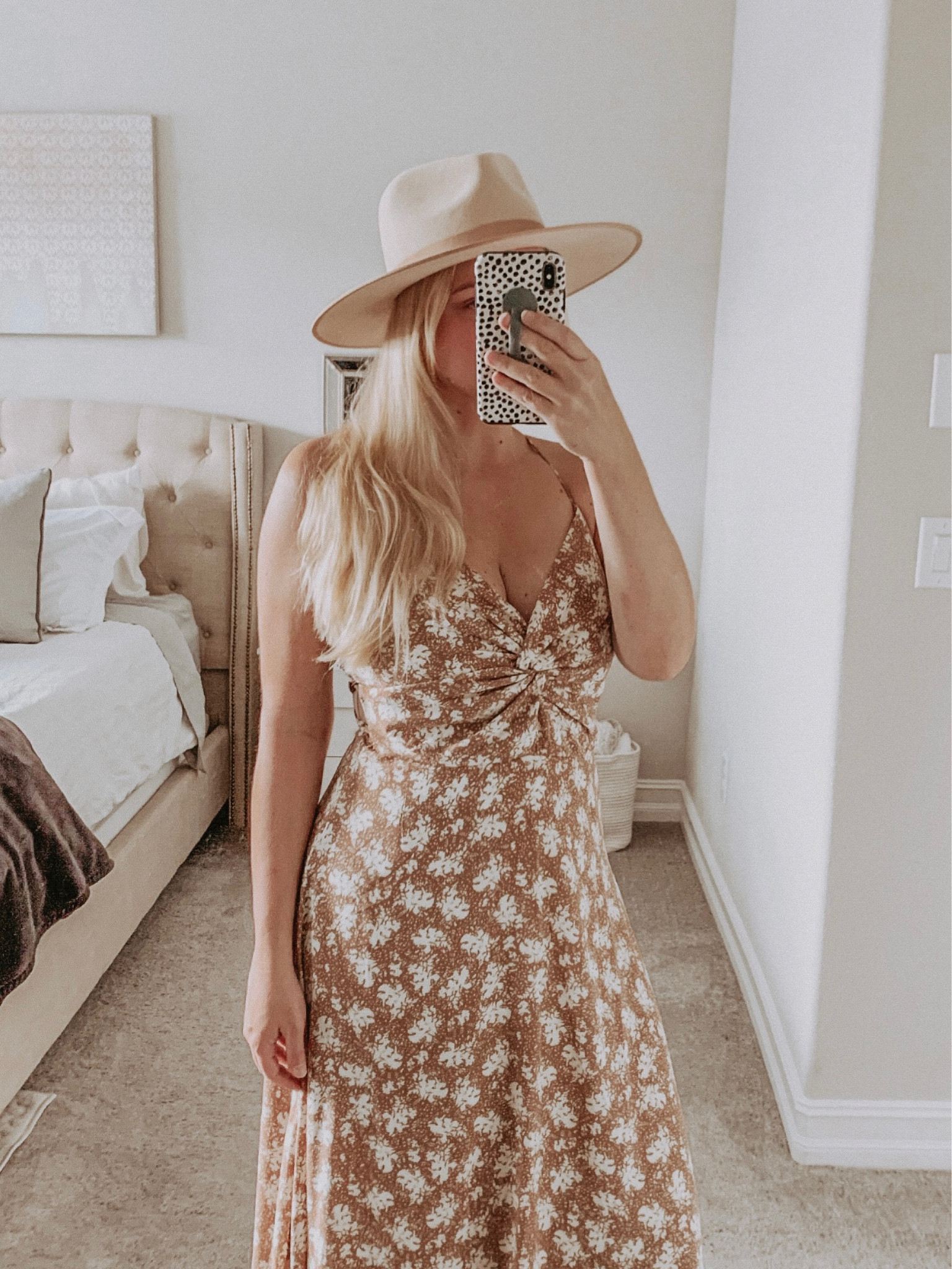 This floral midi / maxi dress from Lulu’s is the perfect dress for Spring! I wore this for my engagement photos. The back is open with cross ties - super cute! I’ve paired it with a rancher hat here to make it more of a casual outfit and linked both. Right now, this dress is 30% off in the Lulu’s app. I’ve linked some other floral maxi dress favorites as well  

#LTKSeasonal #LTKwedding #LTKsalealert