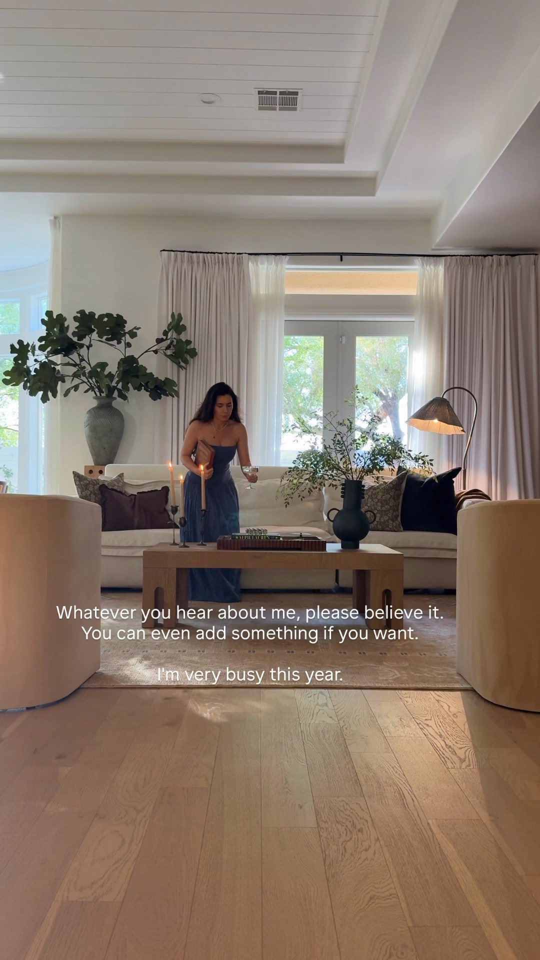Living room - coffee table, lamp, stems, rug, vase