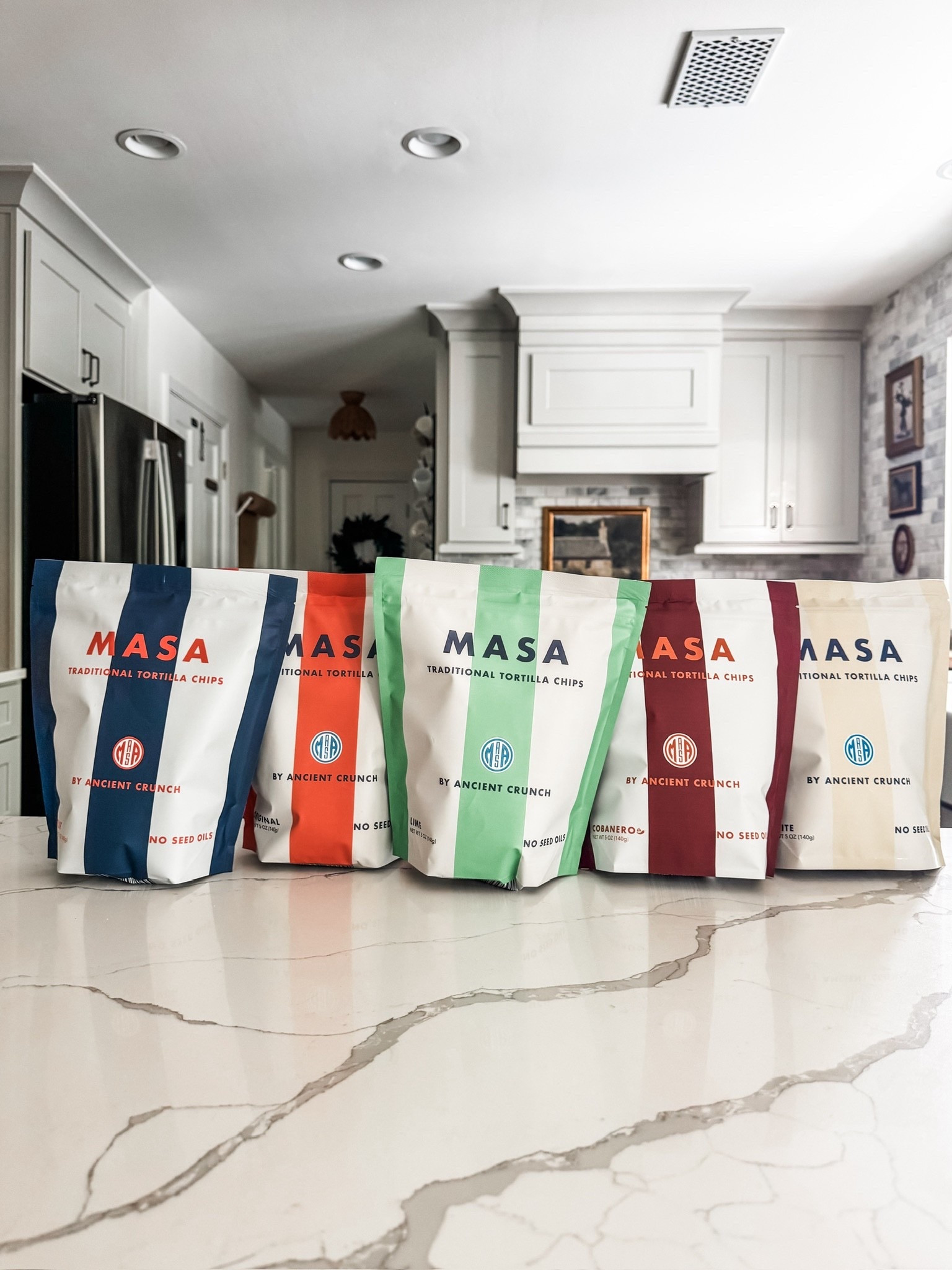 Colorful chips for a colorful kitchen moment 🌈 From sea salt to spicy habanero, these MASA Traditional Tortilla Chips by Ancient Crunch bring bold flavor and thoughtful ingredients—styled perfectly against marble-look quartz, shaker cabinets, and stainless steel appliances. ✨
#MASATortillaChips #AncientCrunch #CleanSnacks #KitchenDetails #QuartzCountertop #ModernKitchenDesign #HealthyLiving #SnackTimeInStyle #eanesinteriors



#LTKHome #LTKselfcare #LTKmomlife
