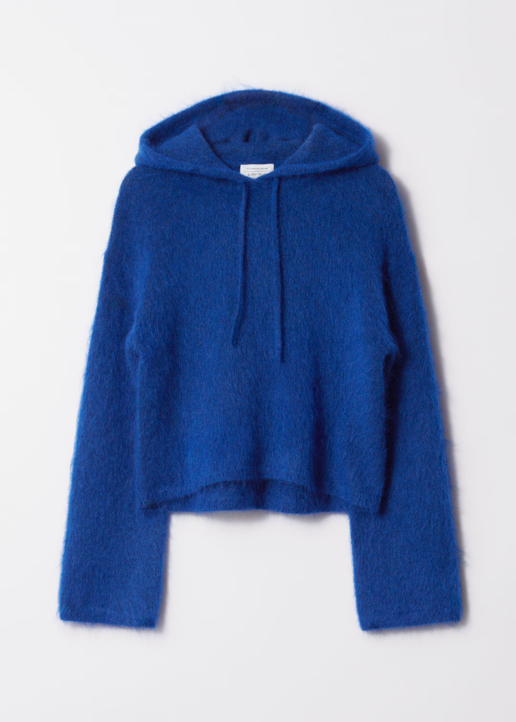 Gebreide hoodie in een mohairmix | H&M (DE, AT, CH, NL, FI)