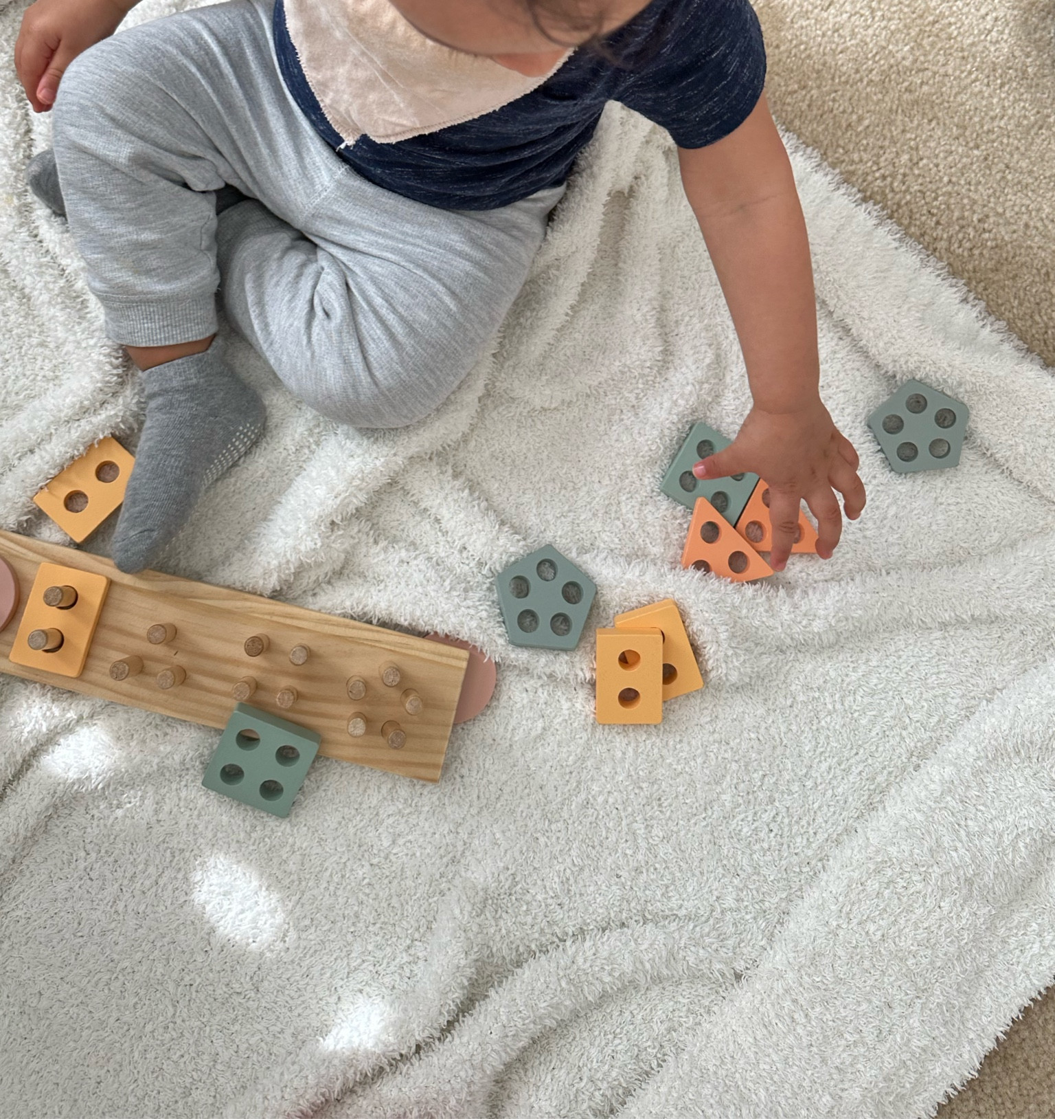 Wooden toys are Ezra’s favorite.

#LTKbaby