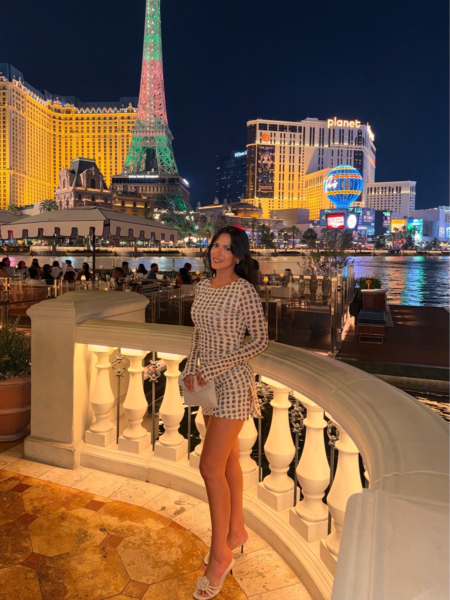 **Vegas girls trip ✨** Wearing the cutest RESA mini dress with my YSL bag for dinner with a view. The perfect little Vegas night-out look — linking my outfit + similar finds!