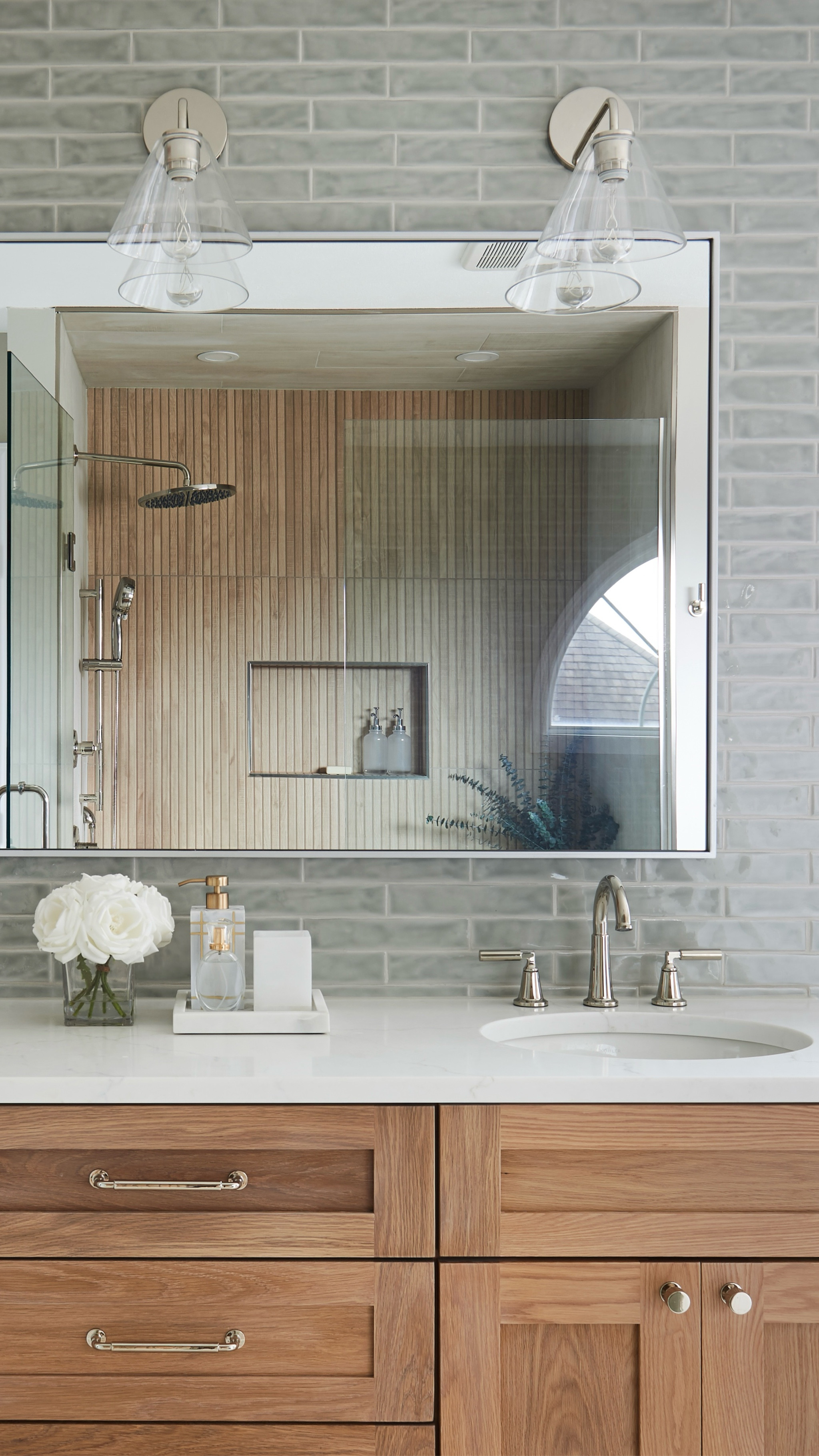 Polished nickel, subtle sage, and warm wood tones for this oasis of a bathroom. 😌

#LTKStyleTip #LTKHome