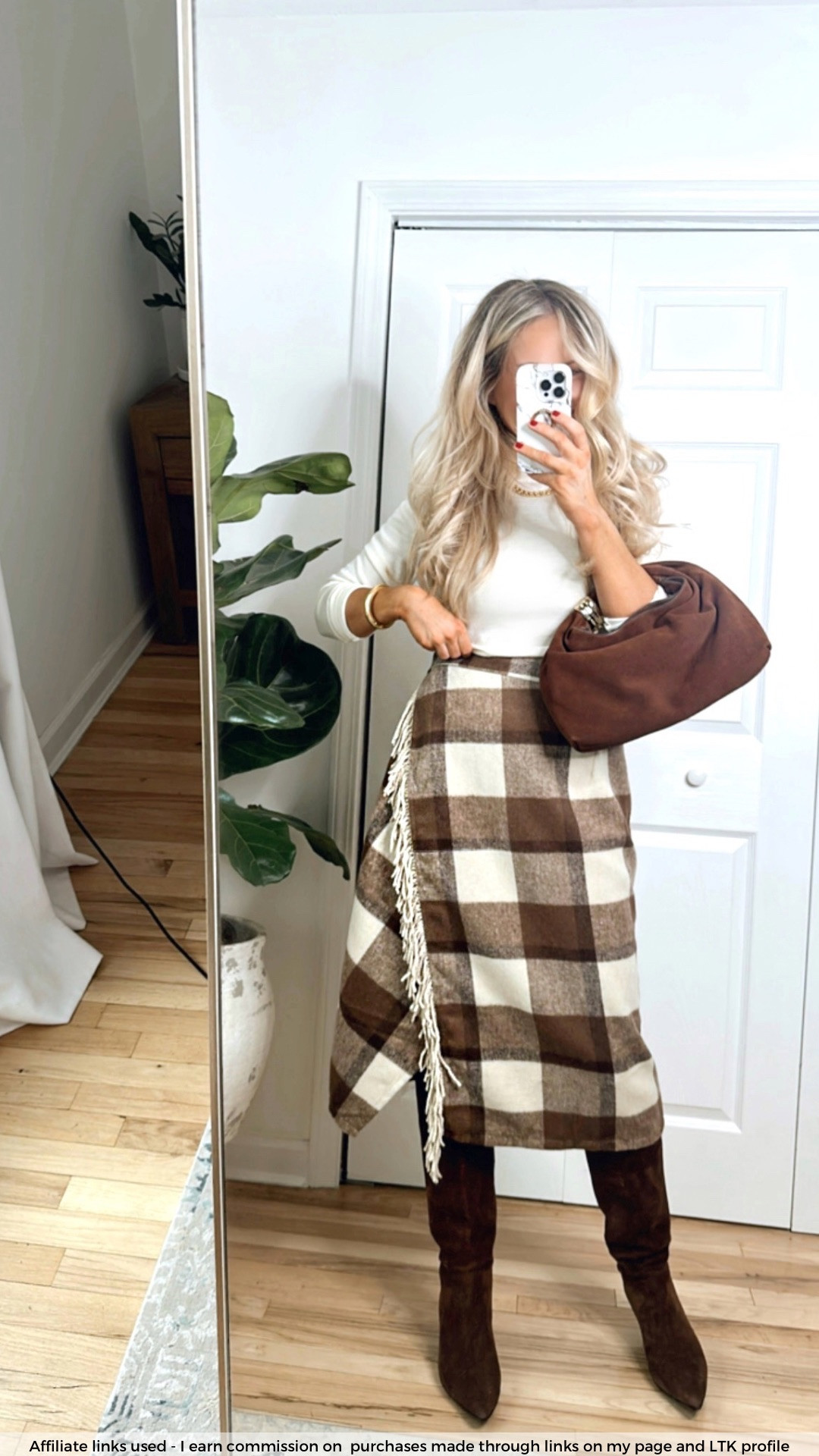Coffee date outfit

Amazon plaid midi skirt
J.Crew cream turtleneck sweater fitted
Madewell brown suede bag
Brown suede knee high boots
Fall fashion 