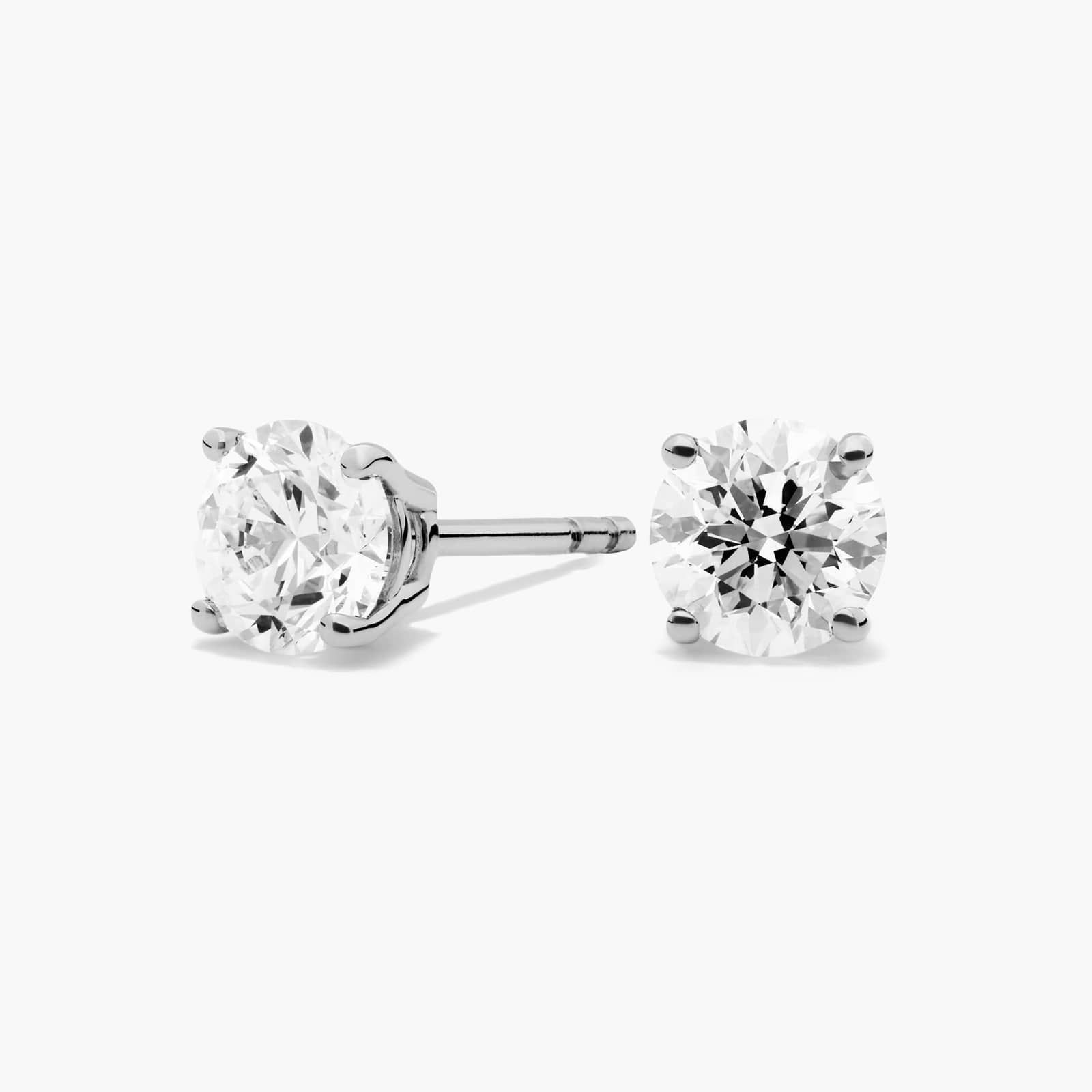 Four Prong Round Brilliant Lab Grown Diamond Stud Earrings in 14k White Gold (1 Ct. tw. - F-G / V... | Blue Nile