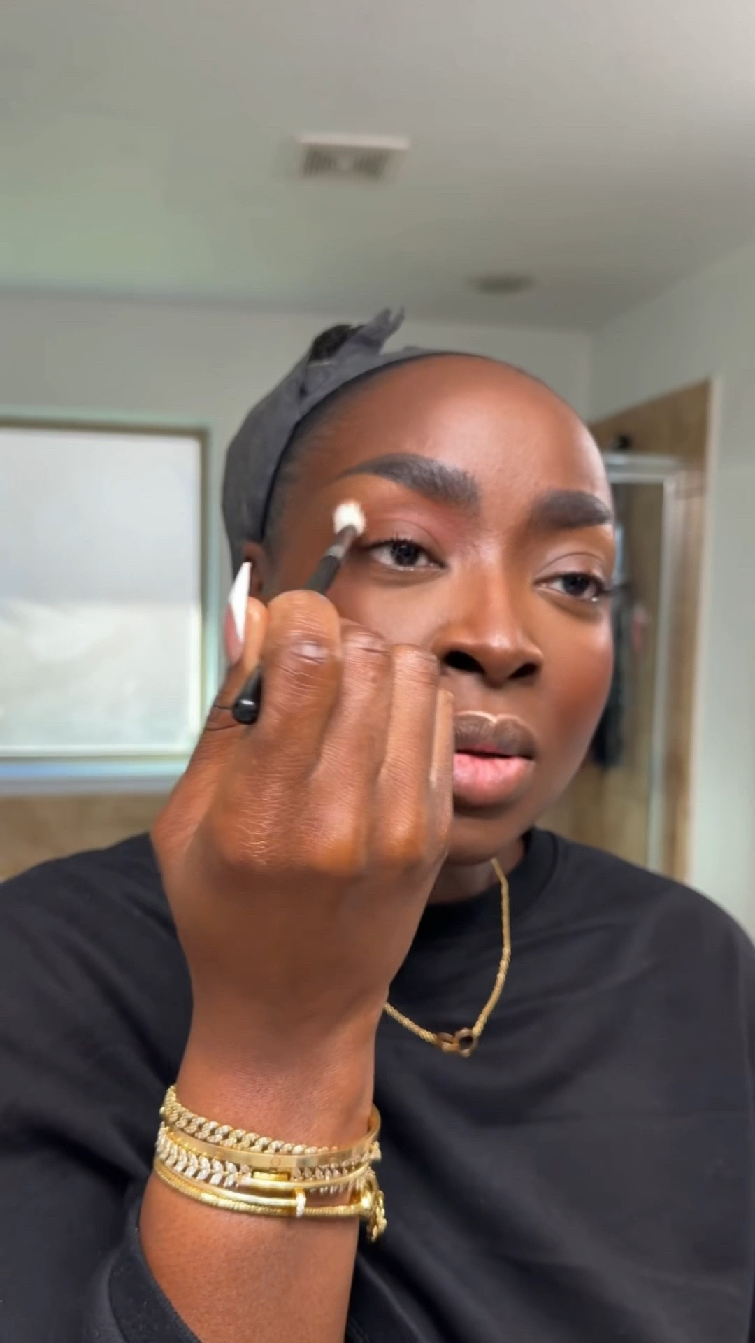 I always start off every makeup look with a reddish orange color. This one is from the HUDA beauty warm matte obsessions palette.