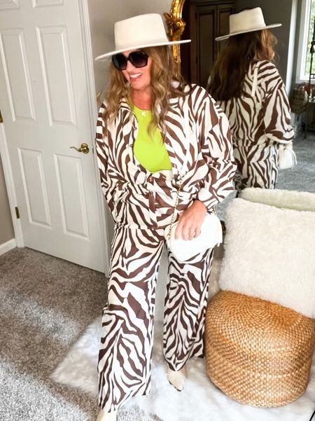 When you want to step out of the basics
A zebra print 2 piece from @wdirara_official that is available in other colors really delivers!
I added some fun winter accessories and a pop of neon because I am a bit extra like that😁.

#LTKtravel #LTKstyletip #LTKSeasonal