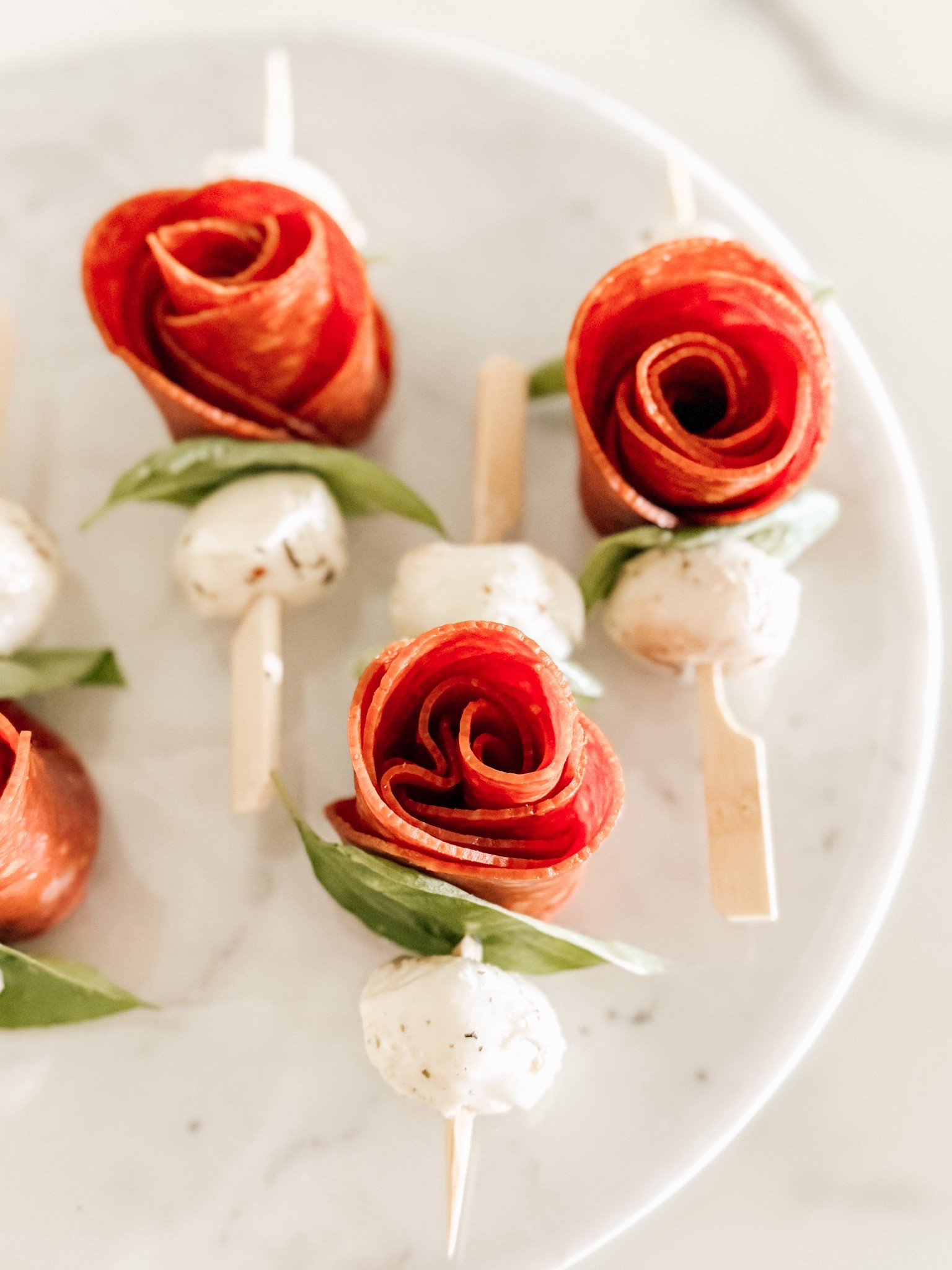 Pepperoni Rose Skewers are the perfect easy and stunning appetizer! 

#LTKSeasonal #LTKHome #LTKParties