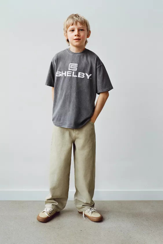 Washed effect T-shirt with round neck and short sleeves. Text print on front and back. | Zara US