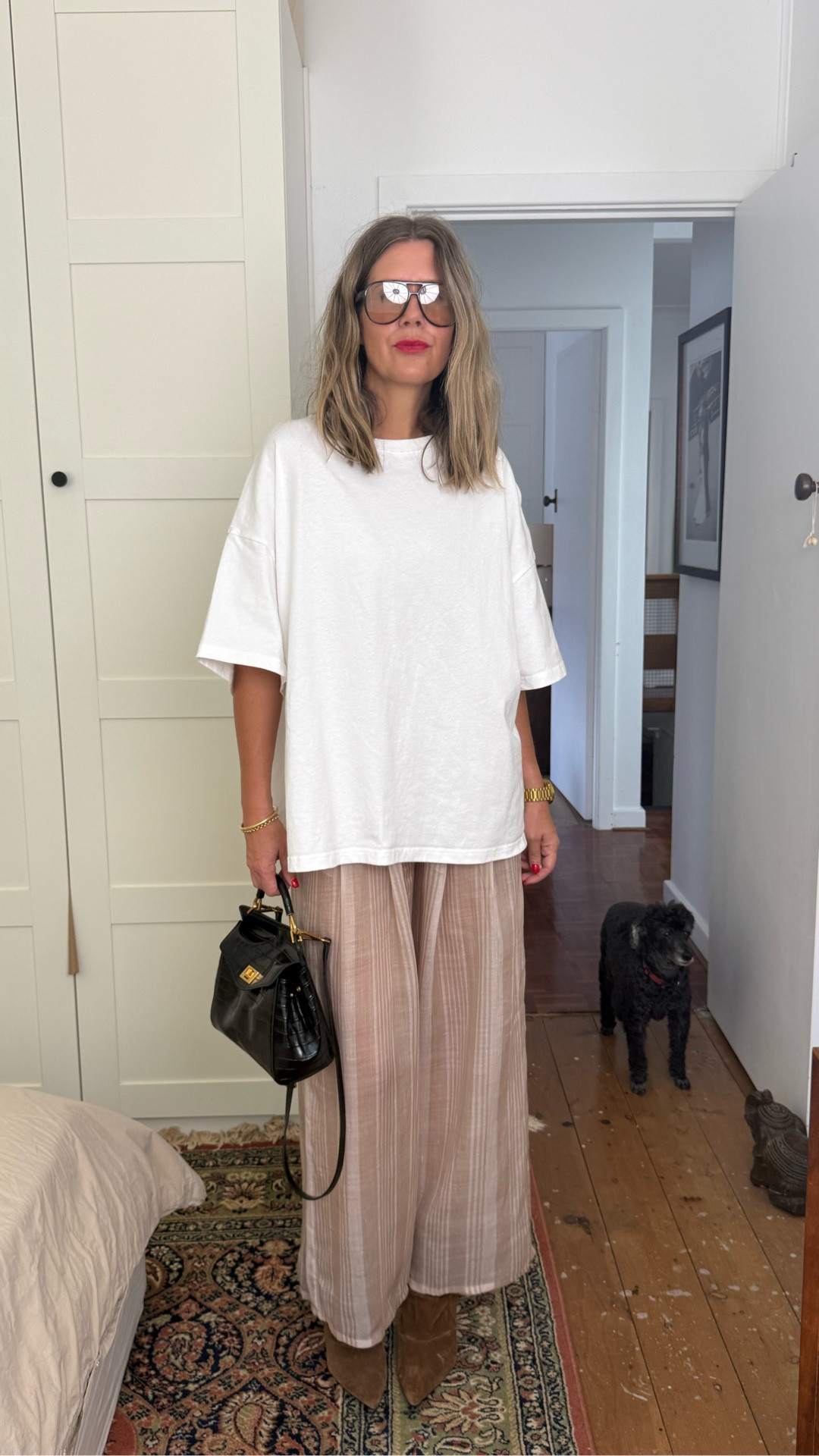 Just waiting for the temp to drop so I can head out in this look — and having a little play with these boots. They’re the missing link in my wardrobe. I am a firm believer that a shoe can make or break an outfit and these boots are making all my AW looks. Finish the look with a leather or suede bomber or even a relaxed denim jacket.

Wearing a 10 in the tee, small in the pants and boots are true to size x

#LTKSeasonal #LTKgrwm #LTKootd