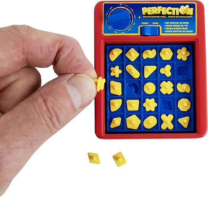 World's Smallest Perfection, Fully Functional Miniature Game, Classic Fast-Paced Shape Game for K... | Amazon (US)