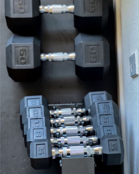 Home gym equipment: CAP dumbbells and A-frame to hold the 5, 8, 15, 25, and 35 pound dumbbell sets (60# on the floor - too heavy for the A-frame) from Walmart with the puzzle flooring and foam roller from Amazon 

#LTKStyleTip #LTKActive #LTKFitness