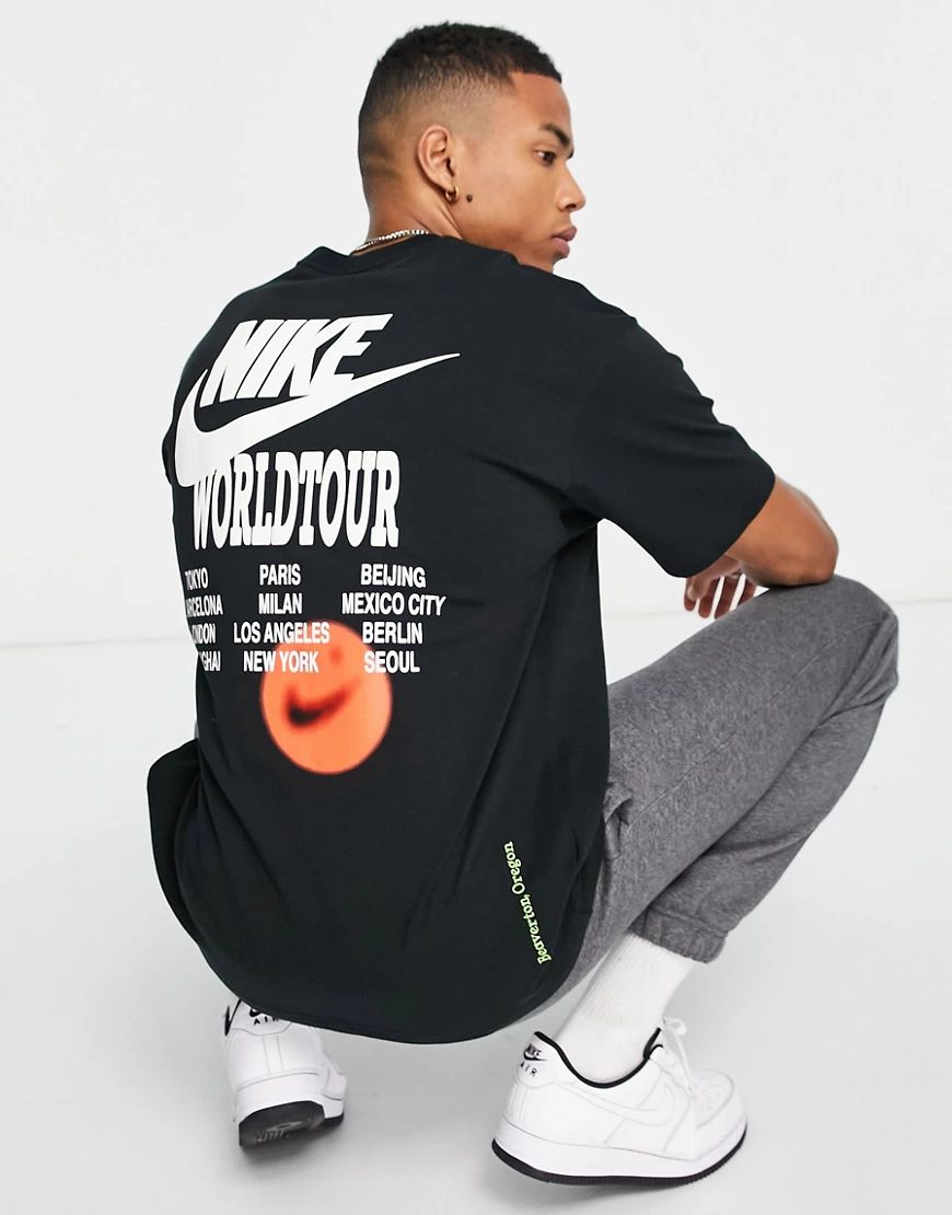 Nike World Tour Pack graphic oversized t-shirt in black | ASOS (Global)