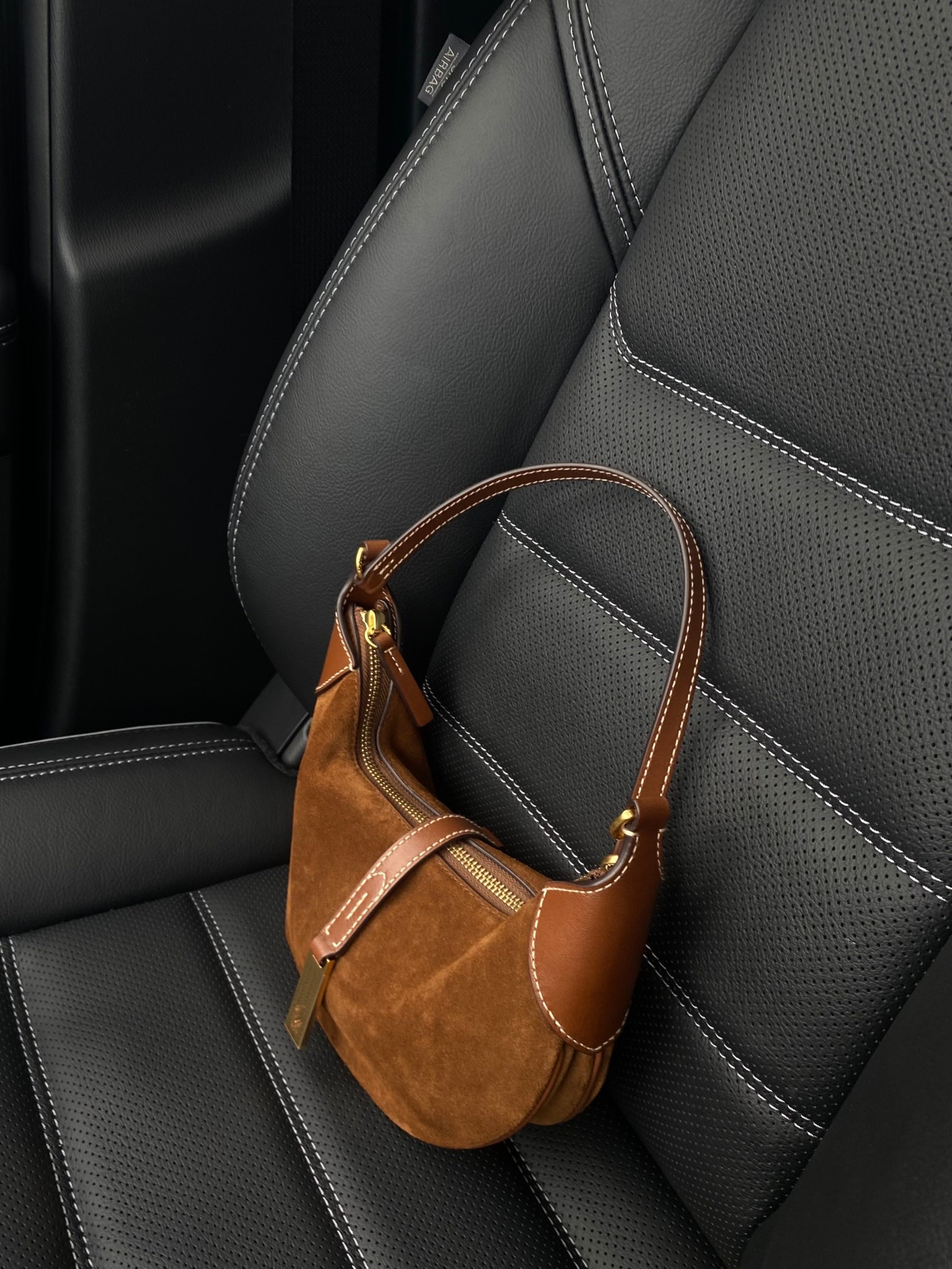 Polo ID mini shoulder bag in color cinnamon/cuoio 