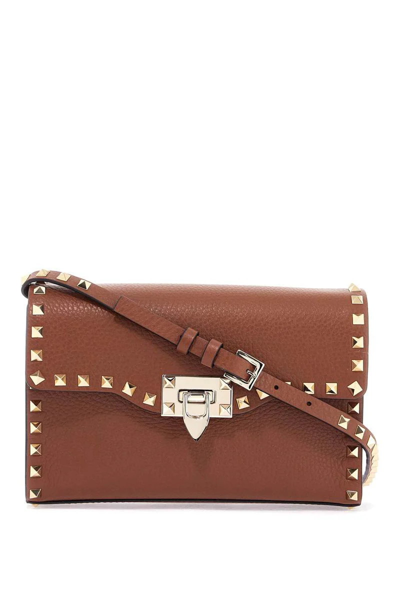 small brown leather shoulder bag with studs | Baltini