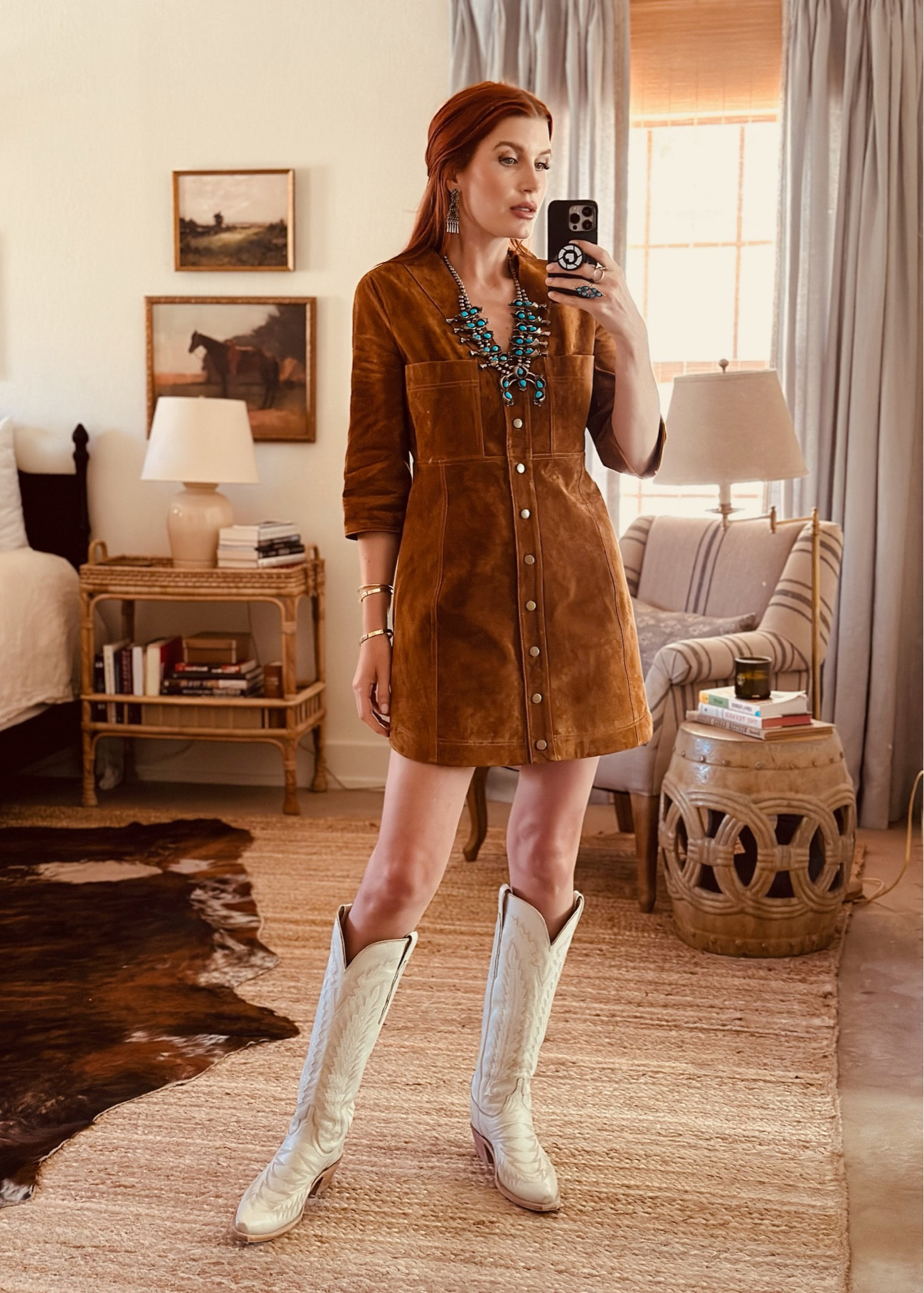 This Hunter Bell suede mini dress will be a layering staple for me this fall. It’s a great base layer that you can build on, but it’s also a hero piece on its own. I added my turquoise jewelry and creamy cowboy boots - such a classic look for rodeo season🤠

#LTKSeasonal #LTKShoeCrush #LTKStyleTip