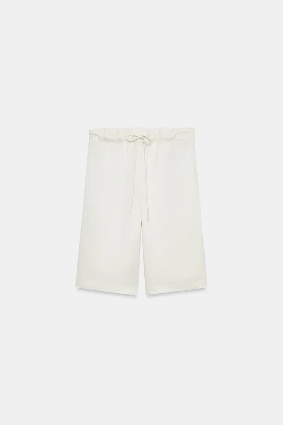ZARA WOMAN COLLECTIONBermuda shorts made from a yarn blend containing 14% linen. Featuring a mid-... | Zara UK