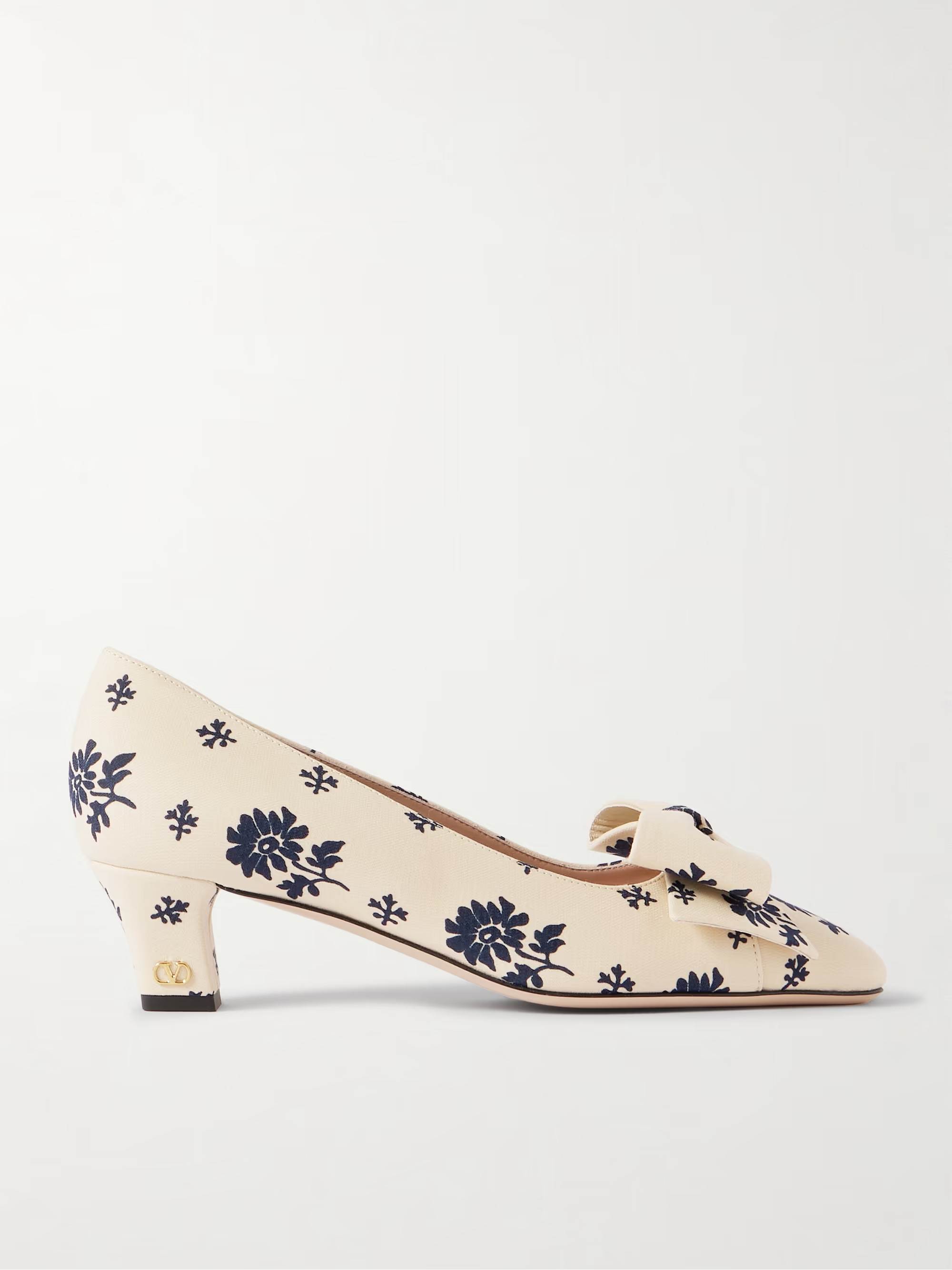 Valentino Garavani's pumps are reminiscent of vintage styles, only with the brand's signature upd... | NET-A-PORTER (US)