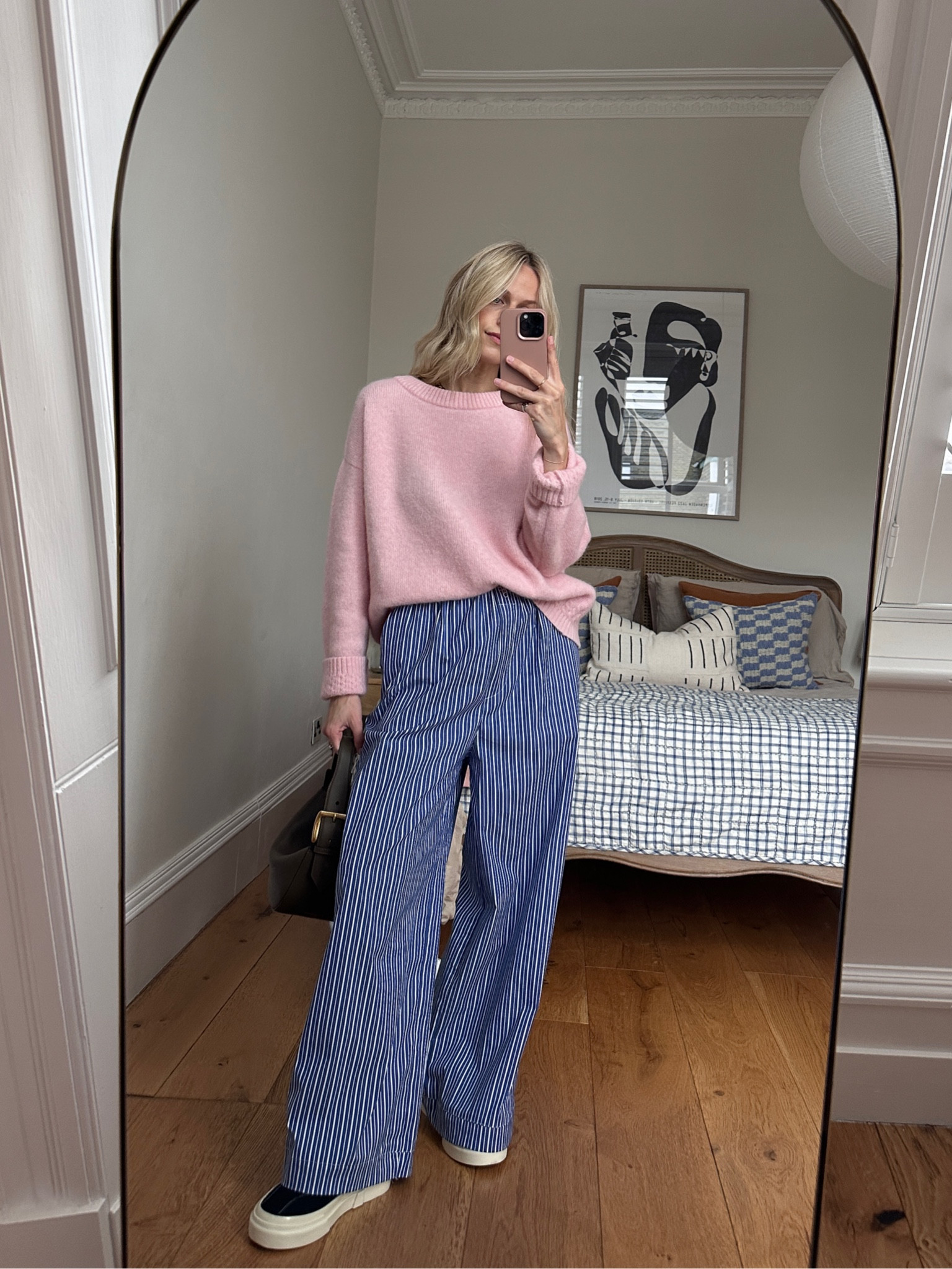 The perfect powder pink knit and striped trousers.

#LTKSeasonal #LTKstyletip #LTKeurope