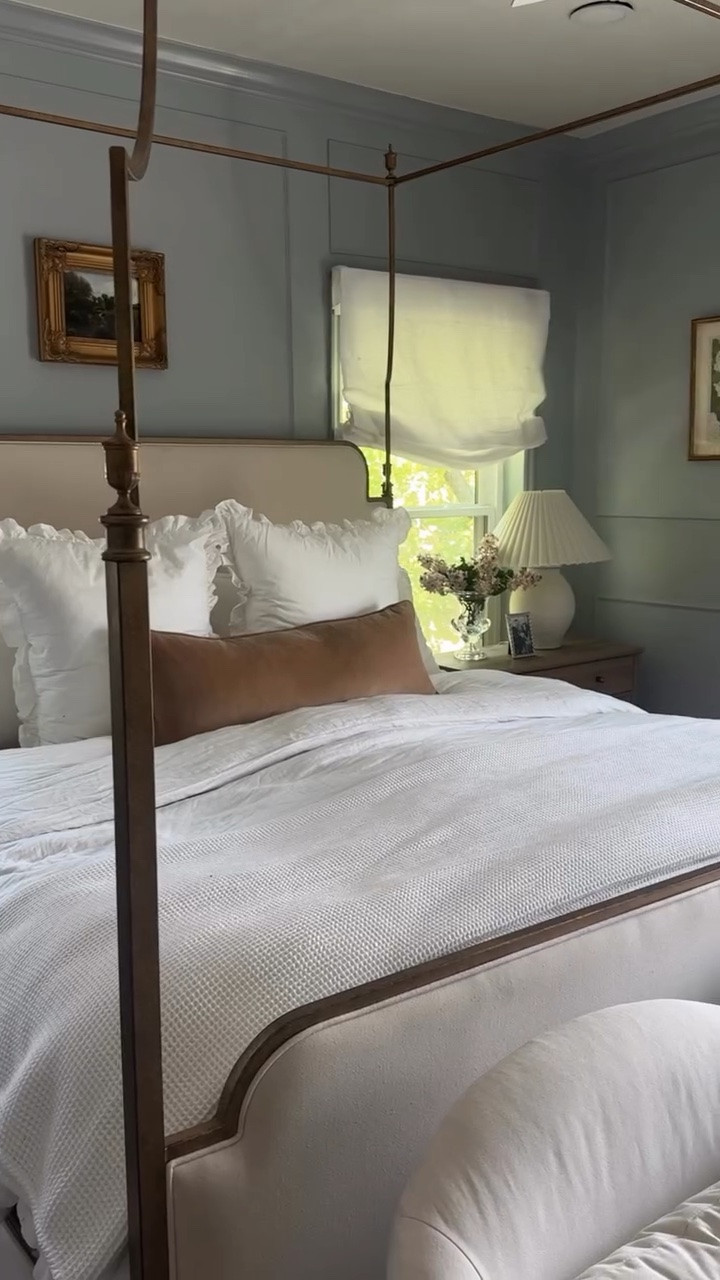 Follow + Comment Blue if you’d like all of the information on my bedroom makeover!  Bye bye white box and hello to my classic dusty blue bedroom!  Bedroom makeover, blue bedroom, classic home, traditional home, canopy bed, Nancy Meyers aesthetic, cozy, collected home.  #bedroommakeover #nancymeyersaesthetic #homedesign #classichome #traditionalhome https://liketk.it/6jXtZ