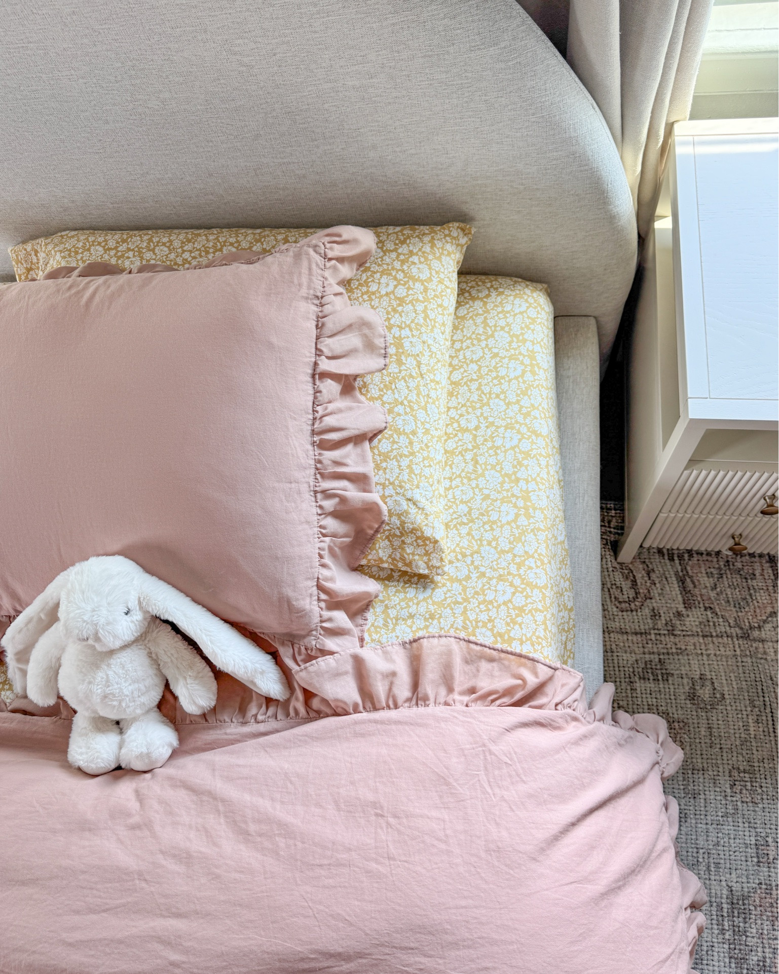 Girl bedding. Pink ruffled duvet and yellow floral print sheet set. Toddler girl bedding, pink bedding.

#LTKHome #LTKKids