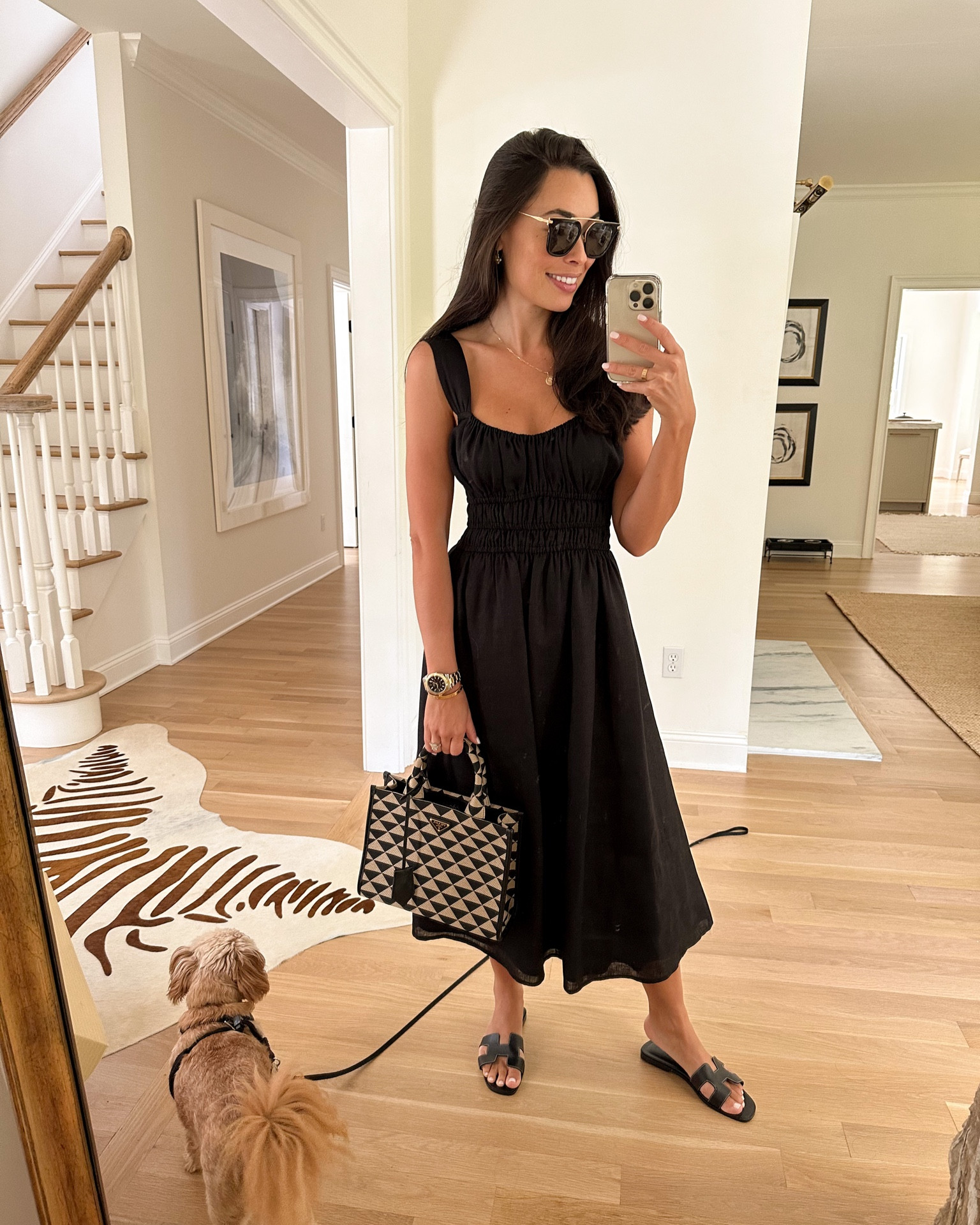 Kat Jamieson wears a black linen dress, Hermes sandals and a Prada bag. 

#LTKitbag #LTKshoecrush #LTKSeasonal