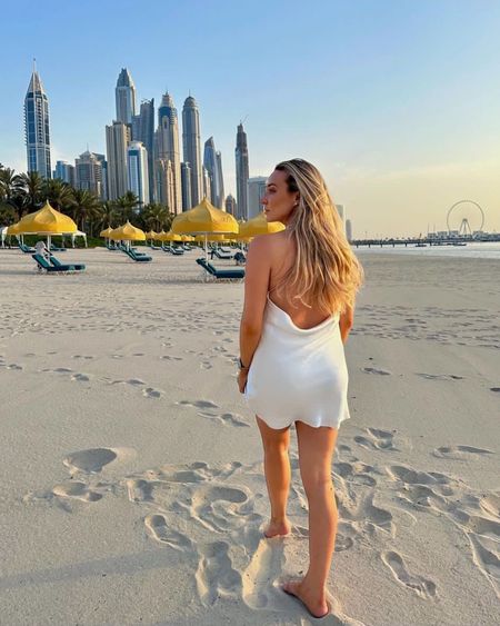Sunsets in Dubai - wearing a white satin cowl neck mini dress - similar linked from hollister

#LTKFind #LTKSeasonal #LTKstyletip