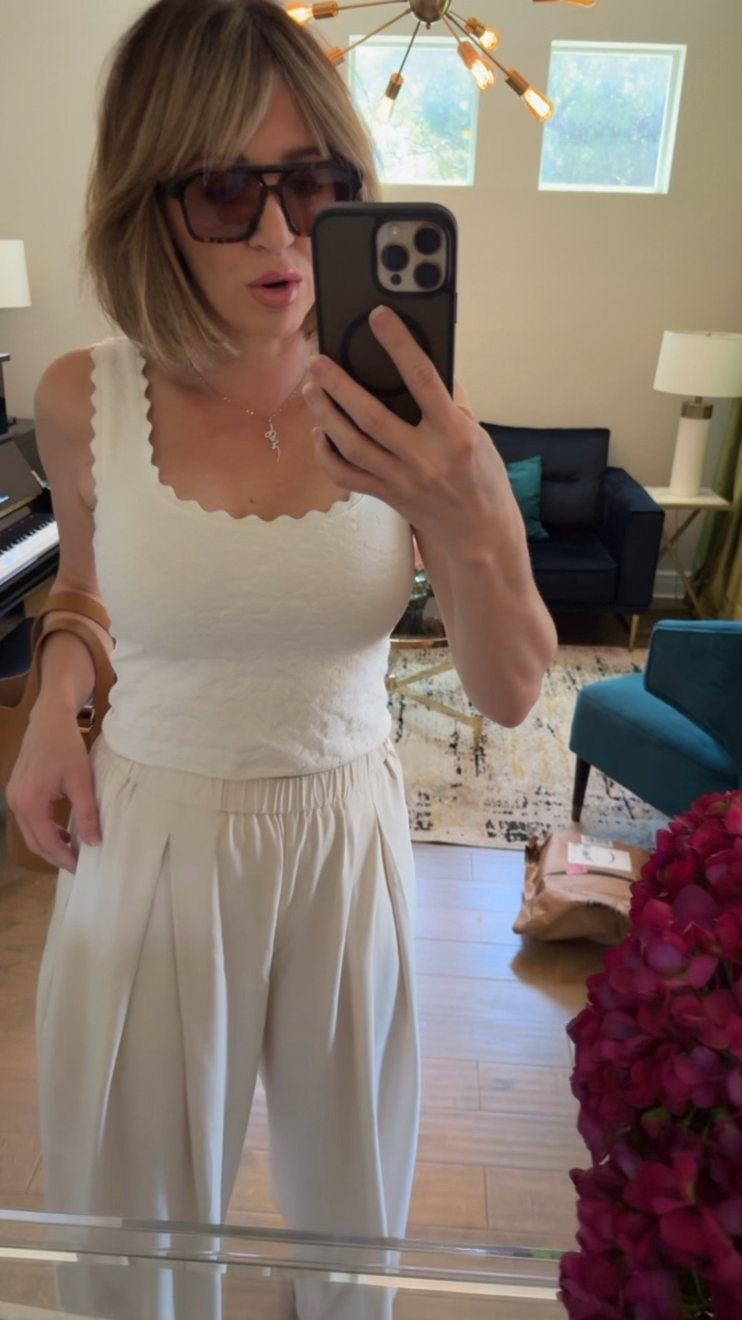 SIZE DOWN in the pants. They run very big. I’m wearing a small.

#LTKootd #LTKgrwm #LTKOver40