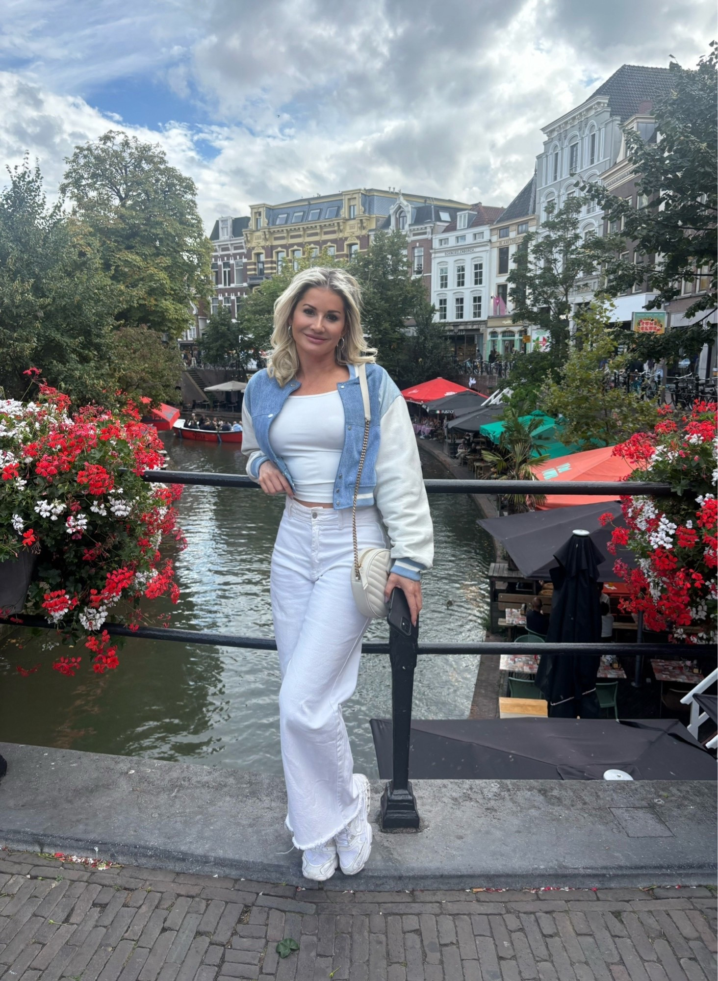 #Amsterdam #streetwear #travel #amsterdamlooks #varsityjacket #fall #jacket #falllooks #springlooks #fashion 

Shop my Amsterdam look. This look can go from fall to Spring. 
I’m 5 ft 3 in 136 lbs wearing 8 US size jeans (40 Europe) (I wear these jeans a little loose) size 6 shoes, Medium jacket and tank. All run true to size. 
*36 D chest

#LTKActive #LTKTravel #LTKSeasonal