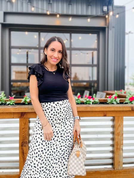 Spring style. 
Black bodysuit with the sweetest ruffle sleeves and midi skirt. 
Amazon find. 
Amazon fashion  
#ltkpetite 

#LTKover40 #LTKworkwear #LTKSeasonal