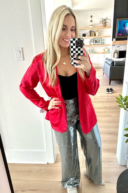 Bought this red silk blazer today from target! It’s perfect for the holidays ✨🎅🏻 love the stretchy material and it’s so soft. Pants are my norm size 10 and they are lined. I’m 5’7 and length is good. I can still wear heels with them. 

#LTKHoliday #LTKmidsize #LTKHolidaySale