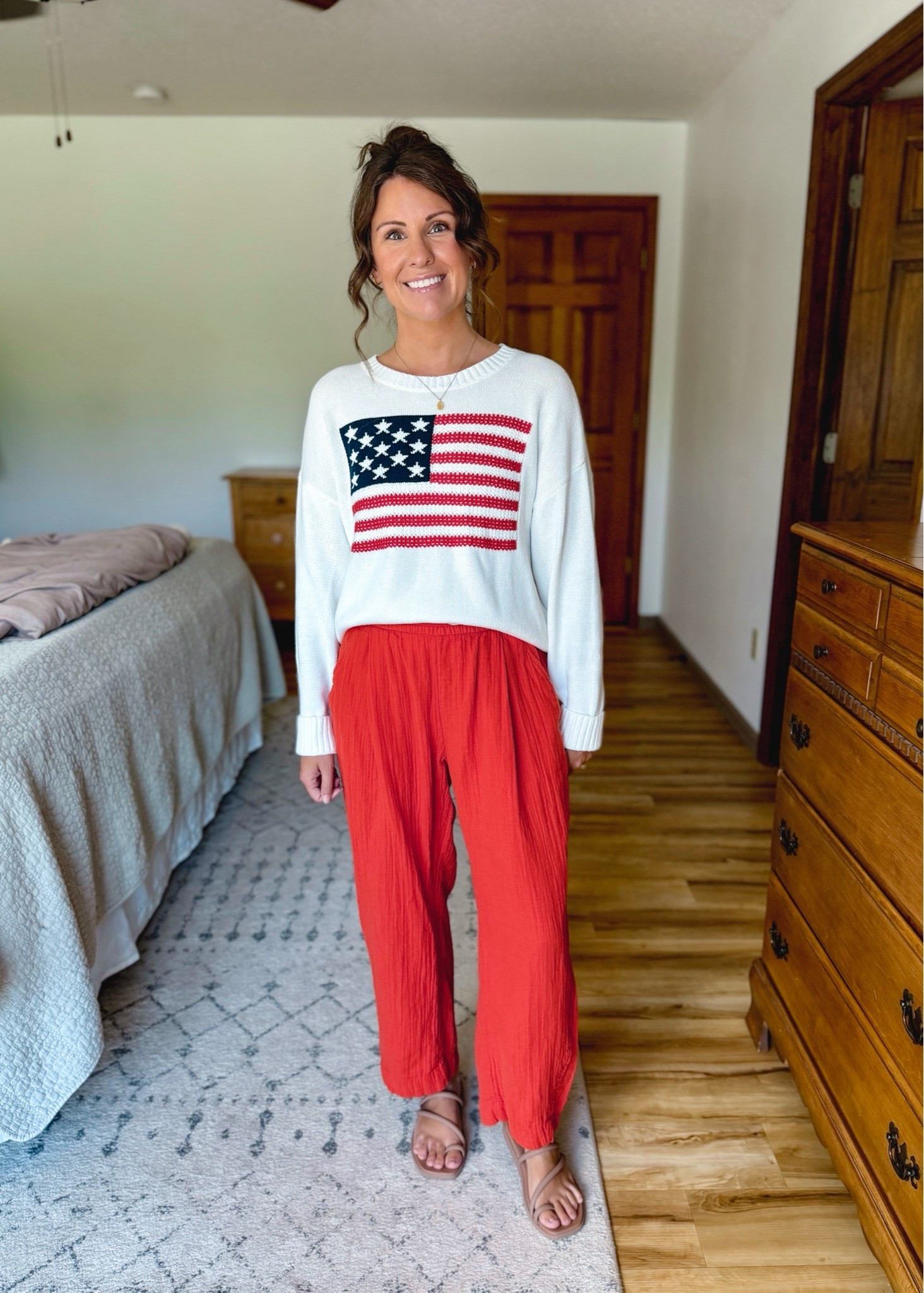 small in my flag sweater (100% cotton!) and XS petite in my pants (selling out—also linked similar ones). My croc sandals are size 6.