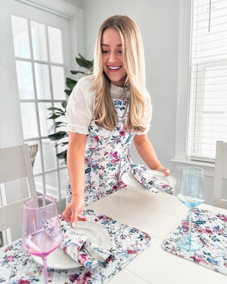 Spring tablescape. Apron. Placemat. Cloth napkin. Colorful wine glasses  

#LTKfindsunder50 #LTKSeasonal #LTKhome