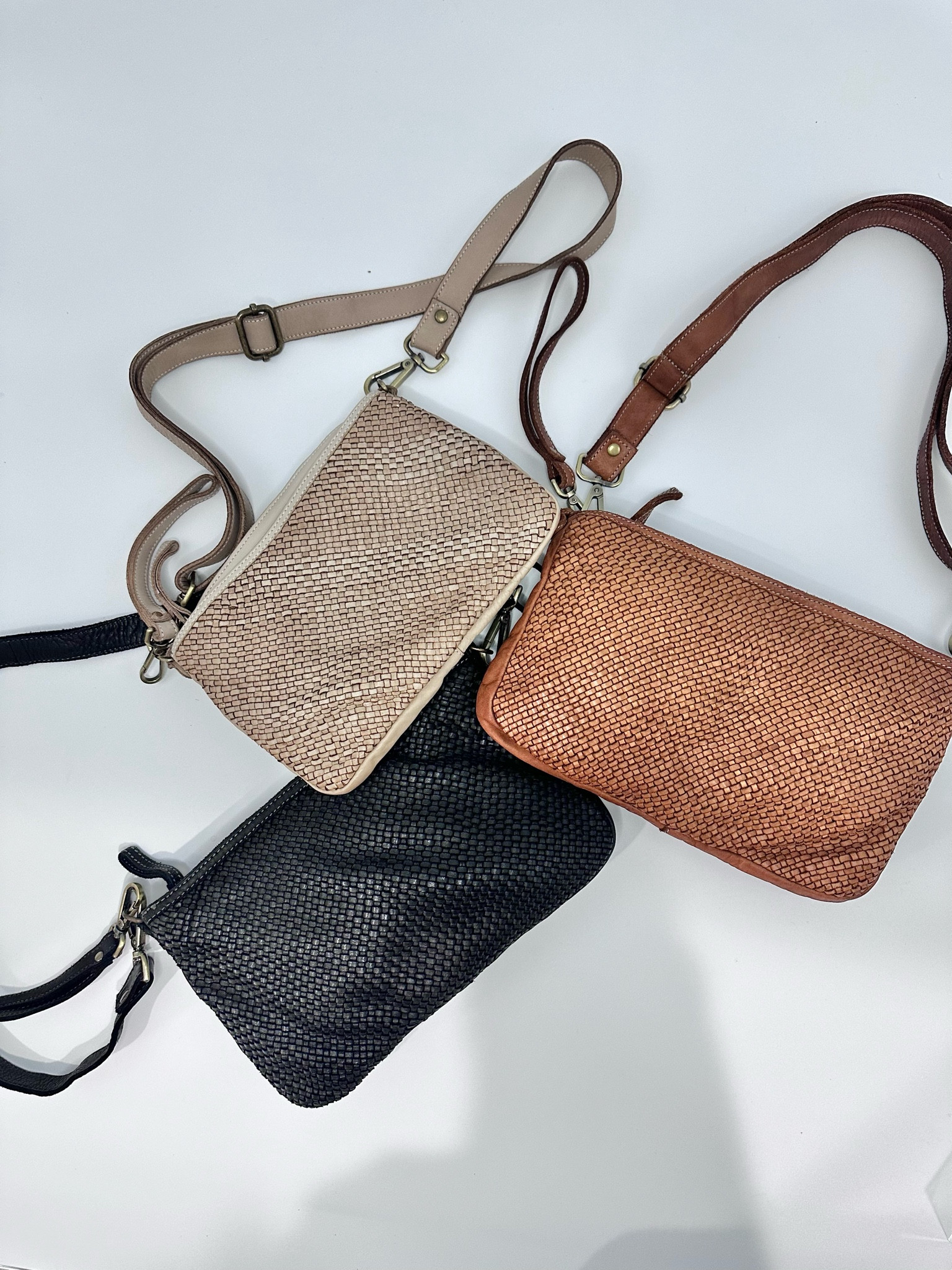 Casual woven leather crossbody bags.   I couldn’t decide what color to get so I got all 3 in the most versatile colors.   #bolsanovahandbags 

#LTKstyletip #LTKitbag