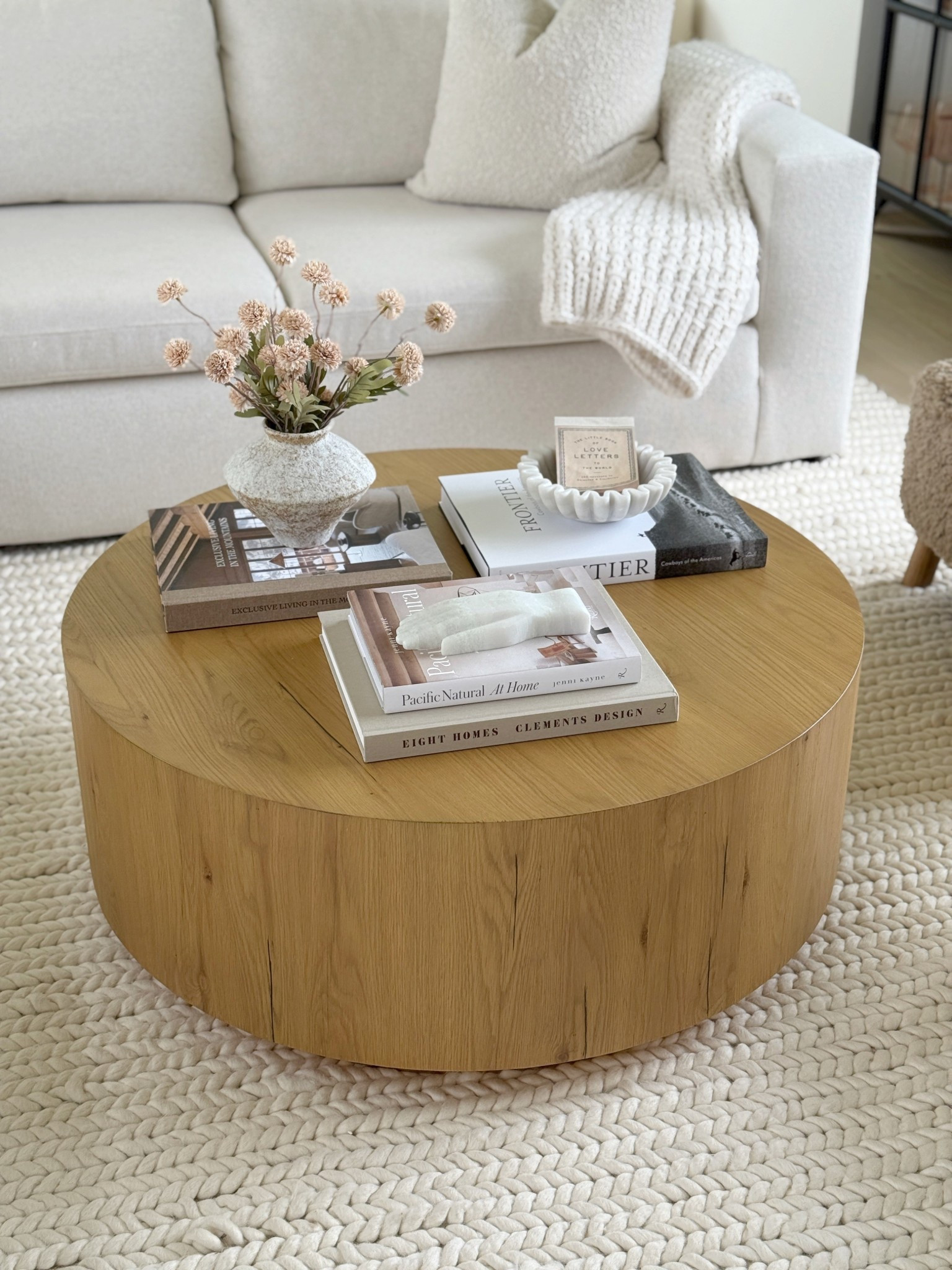 Coffee table styling in the living room👌🏻

Amazon home decor 
Books
Sofa Sectional 

#LTKHome