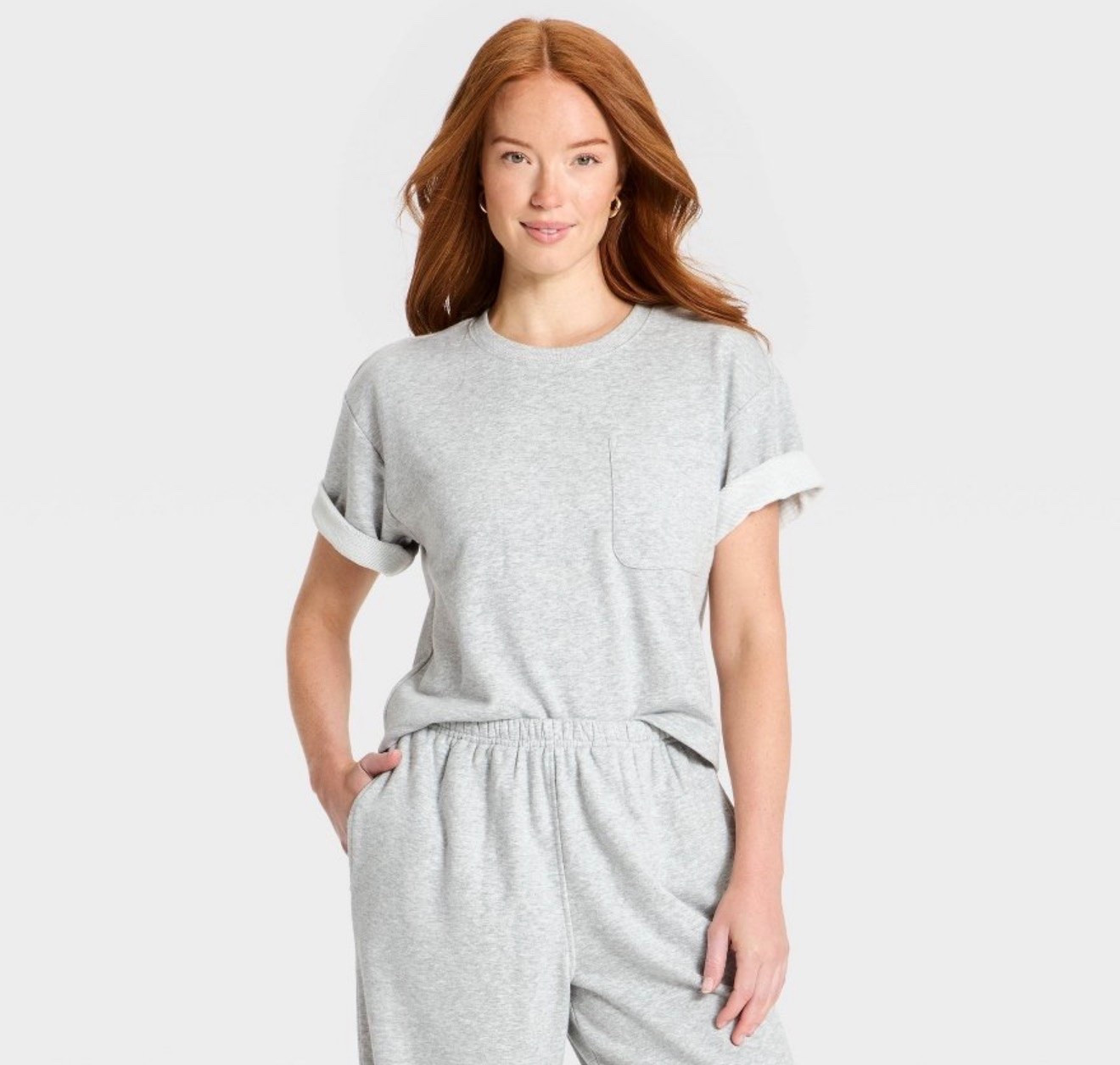 The perfect elevated basic 🤍 This soft gray sweatshirt-style tee features a relaxed fit, rolled sleeves, and a subtle chest pocket. An easy everyday top to pair with jeans, leggings, shorts, or matching sweats for casual, comfortable style. Perfect for travel, errands, weekends, and everyday wear.

#LTKMidsize #LTKSaleAlert #LTKPetite