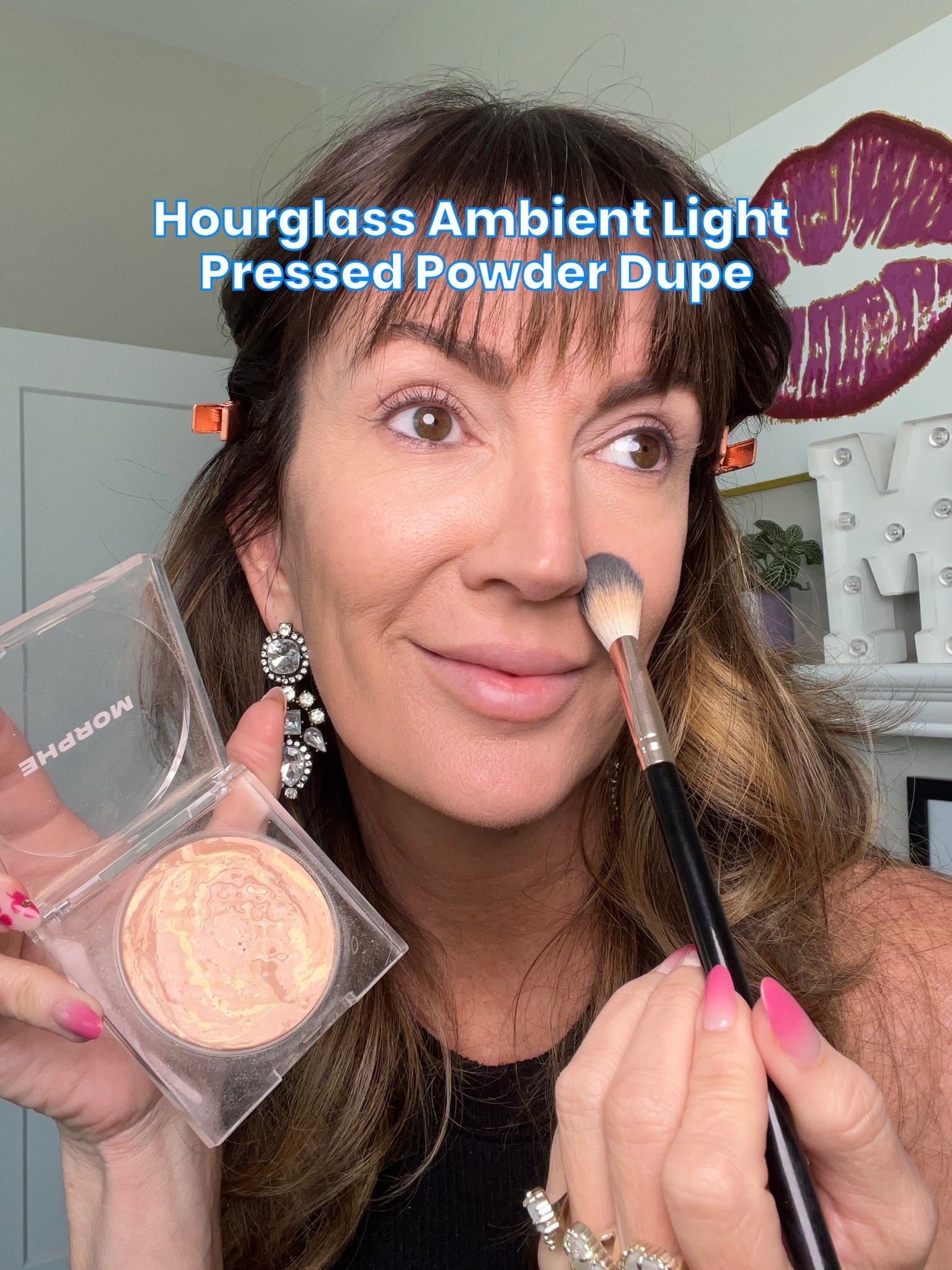 If you’re wanting a beautiful diffusing powder that mimics the pricey Hourglass powder, give this Morphe one a try! It’s a gorgeous affordable option // wearing shade : sunrise

#LTKOver40 #LTKBeauty #LTKmorningroutine