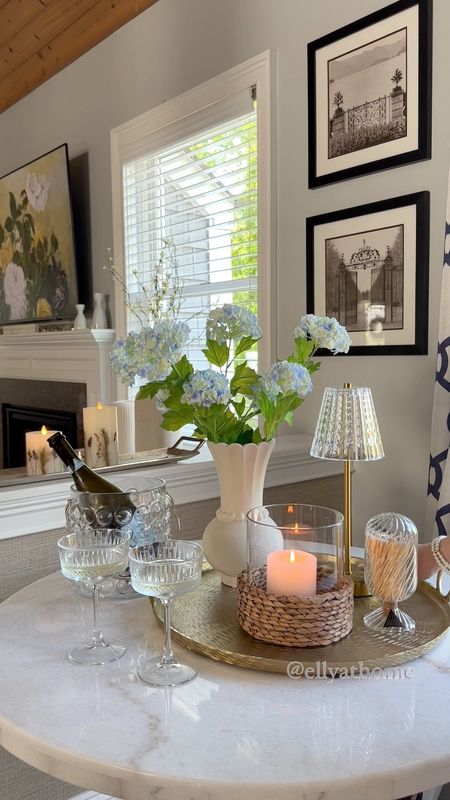 breakfast nook styling! Shop my marble bistro table, area rug, coastal candle, touch light, curtain panels, florals, trays. Prosecco coupe glasses, ice bucket. Summer home decor styling. Amazon home, Wayfair, Walmart, Target  

#LTKFindsUnder50 #LTKVideo #LTKHome