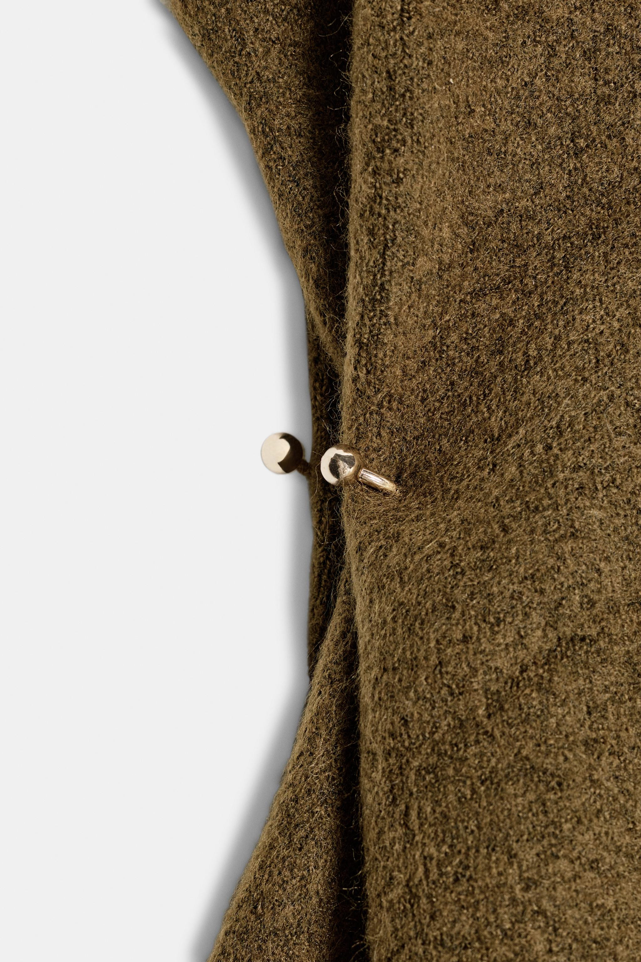 ASYMMETRIC KNIT TOP WITH SIDE APPLIQUÉS | Zara US