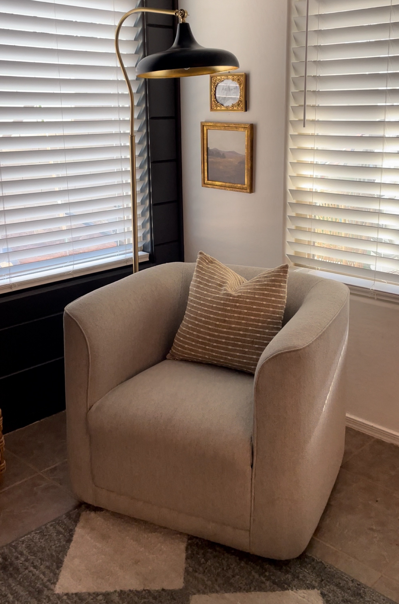 A cute styled corner in our living room with gold frames and a new floor lamp! I wanted a tall floor lamp and this one is on sale too! 

#LTKhome #LTKsalealert #LTKfindsunder100