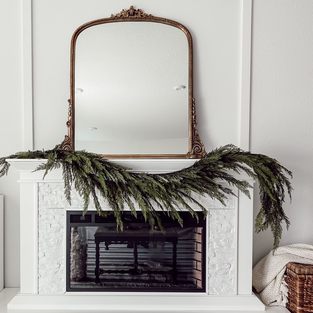 My favorite faux garland I have 2 of the 6ft on mantle using command strip hooks to hold them.  #christmas #christmasgarland #christmasdecor 

#LTKHoliday #LTKhome #LTKSeasonal