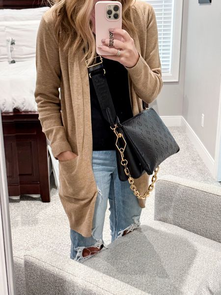 #ootd featuring a casual simplistic look! I love this Carmel Cardigan and black tank combo paired with girlfriend jeans and my LV handbag.

//
Louis Vuitton 
LV handbag
DH Gate
DHGate handbag
Girlfriend jeans
Cardigan
lv coussin bag

#LTKitbag #LTKsalealert #LTKCyberweek